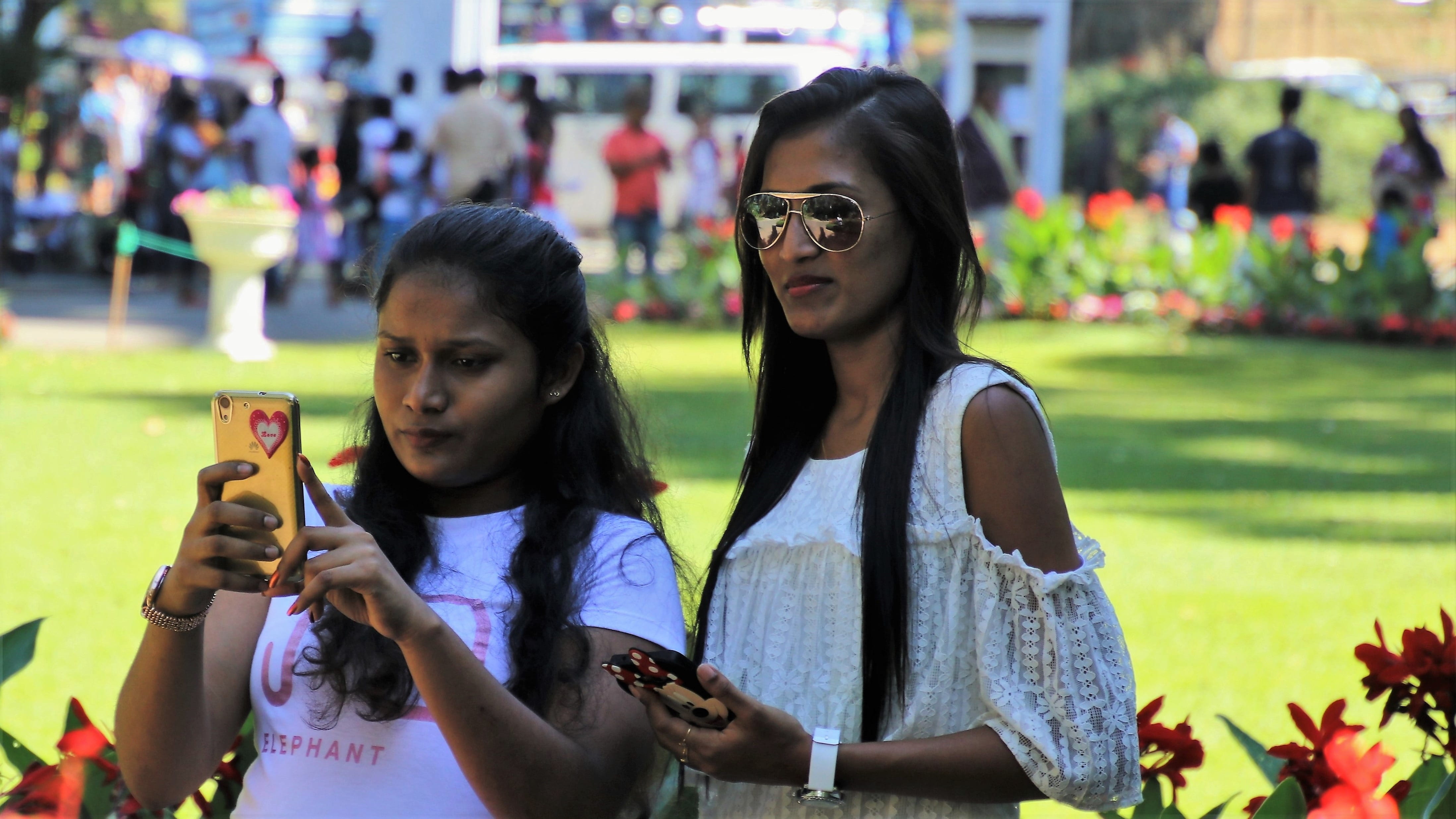 front view, 4K, girl, holding, leisure activity, sri lanka, at the court of, young adult, thoughtfulness, the style of the country, phone, glasses, peace of mind, HD Wallpaper