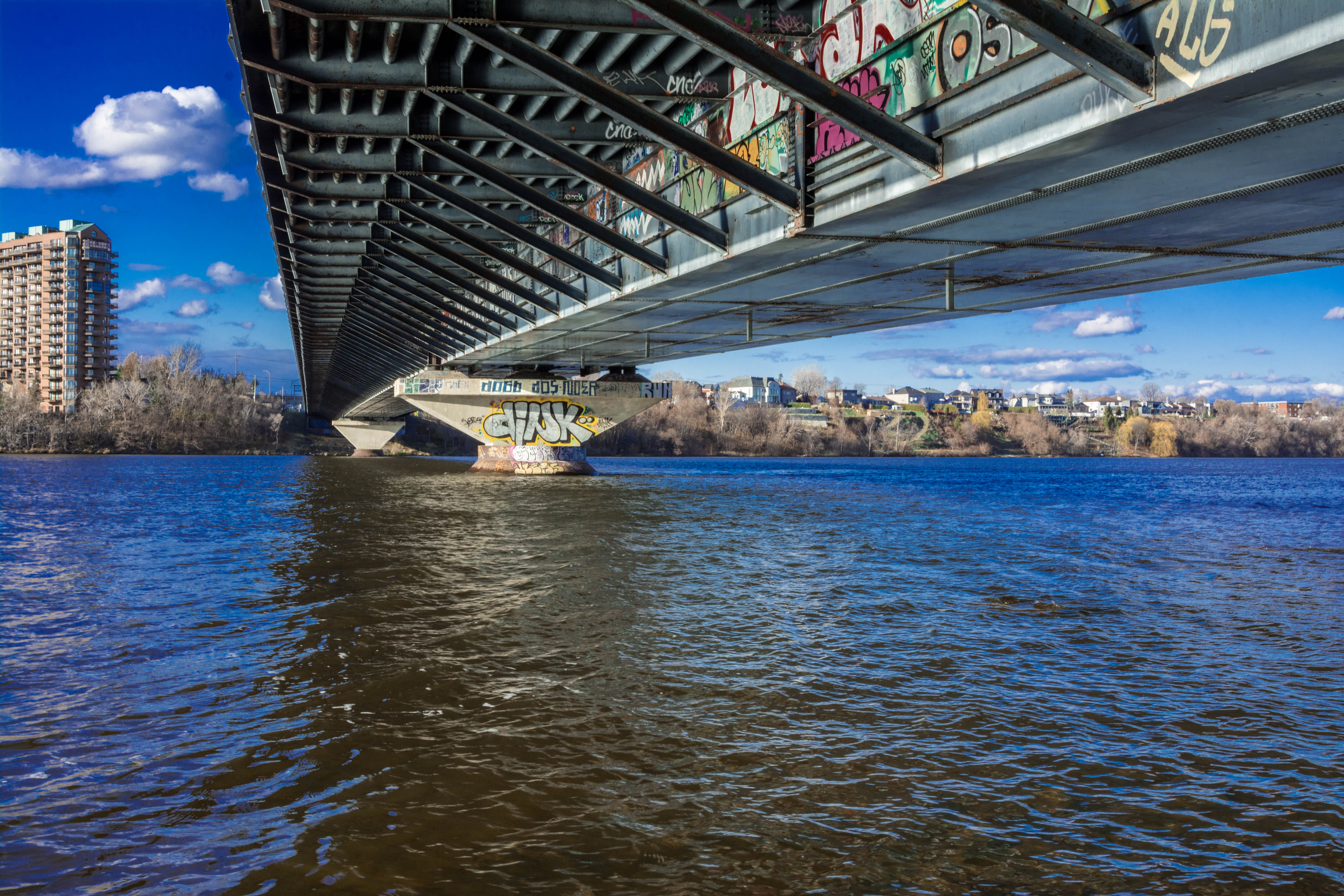 underneath, river, skyscraper, waterfront, art, architecture, cloud - sky, sky, built structure, 5K, transportation, day, building exterior, no people, HD Wallpaper