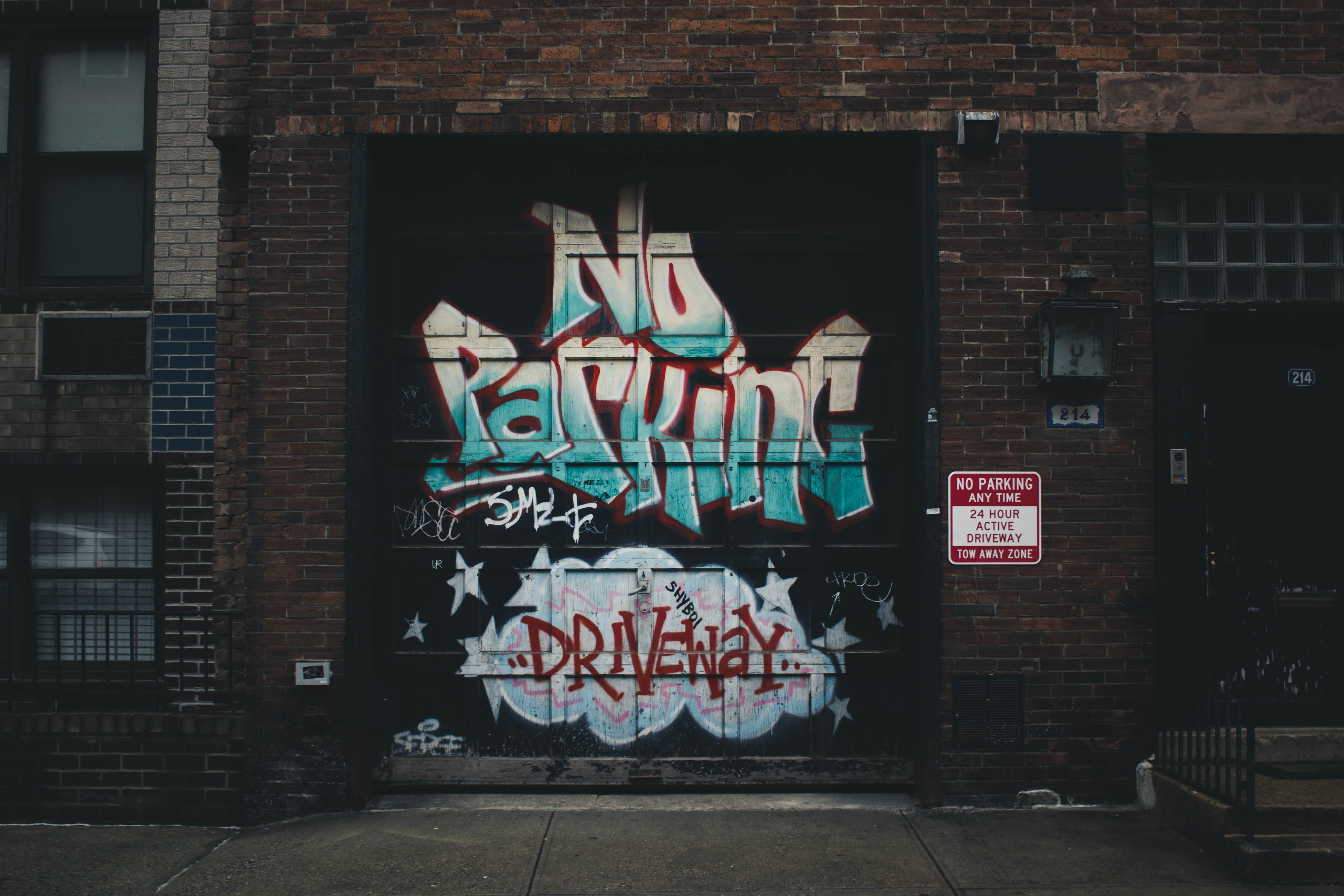 script, sign, architecture, no people, message, building, creativity, garage, wall, building exterior, communication, day, western script, nyc, outdoors, HD Wallpaper