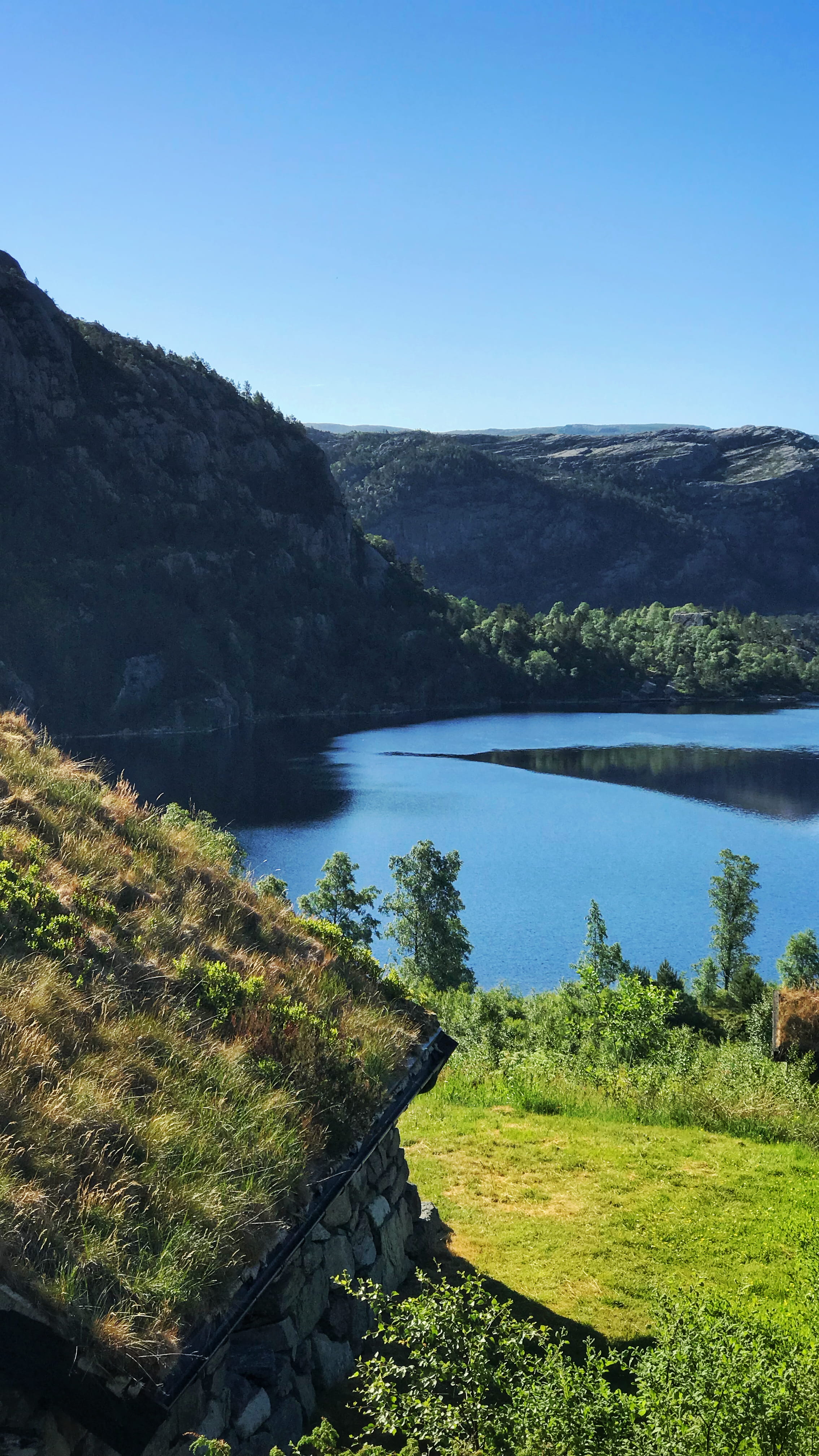 mountain, land, slope, water, norway, preikestolen, promontory, tranquility, scenics - nature, clear sky, oslo, outdoors, sea, day, sky, mountain range, Phone HD Wallpaper