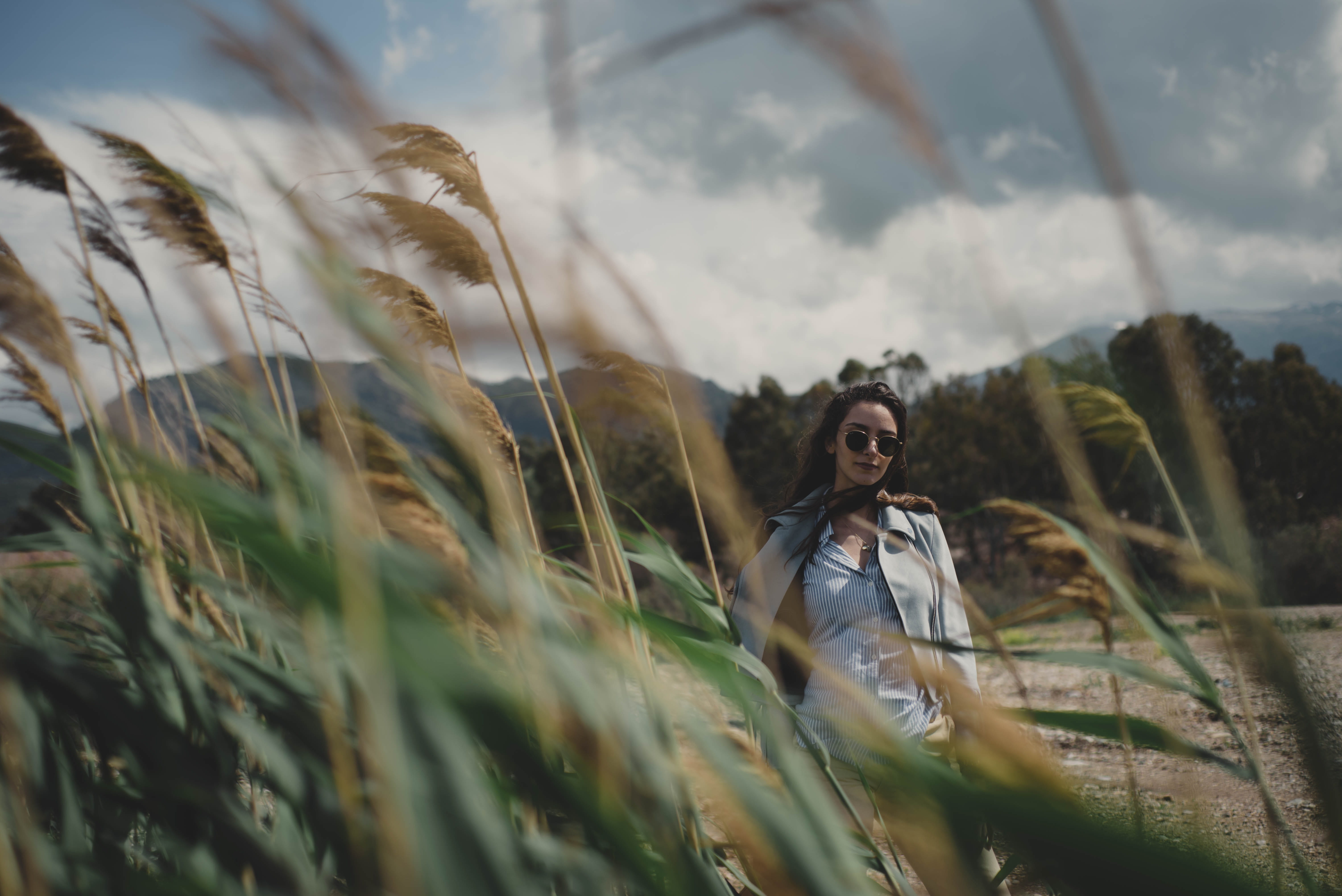 sunglasses, field, selective focus, bookeh, land, one person, plant, leisure activity, face, beauty in nature, girl, sky, vegetation, clothing, lifestyles, HD Wallpaper