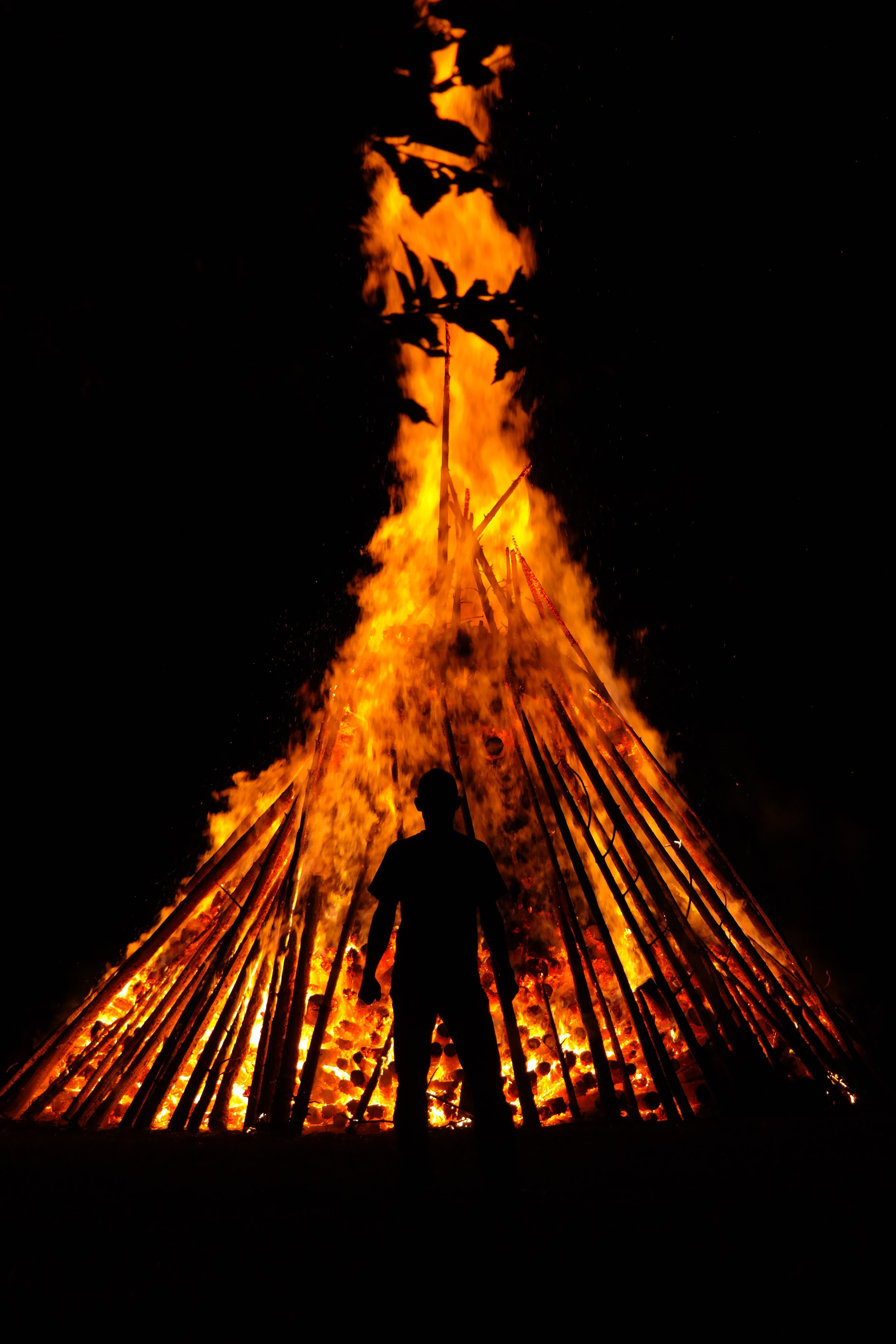 sign, front view, standing, fire - natural phenomenon, festival, evolutionary, mid adult, photo, hot, warning sign, black background, burn, sun, man, flame, Phone HD Wallpaper
