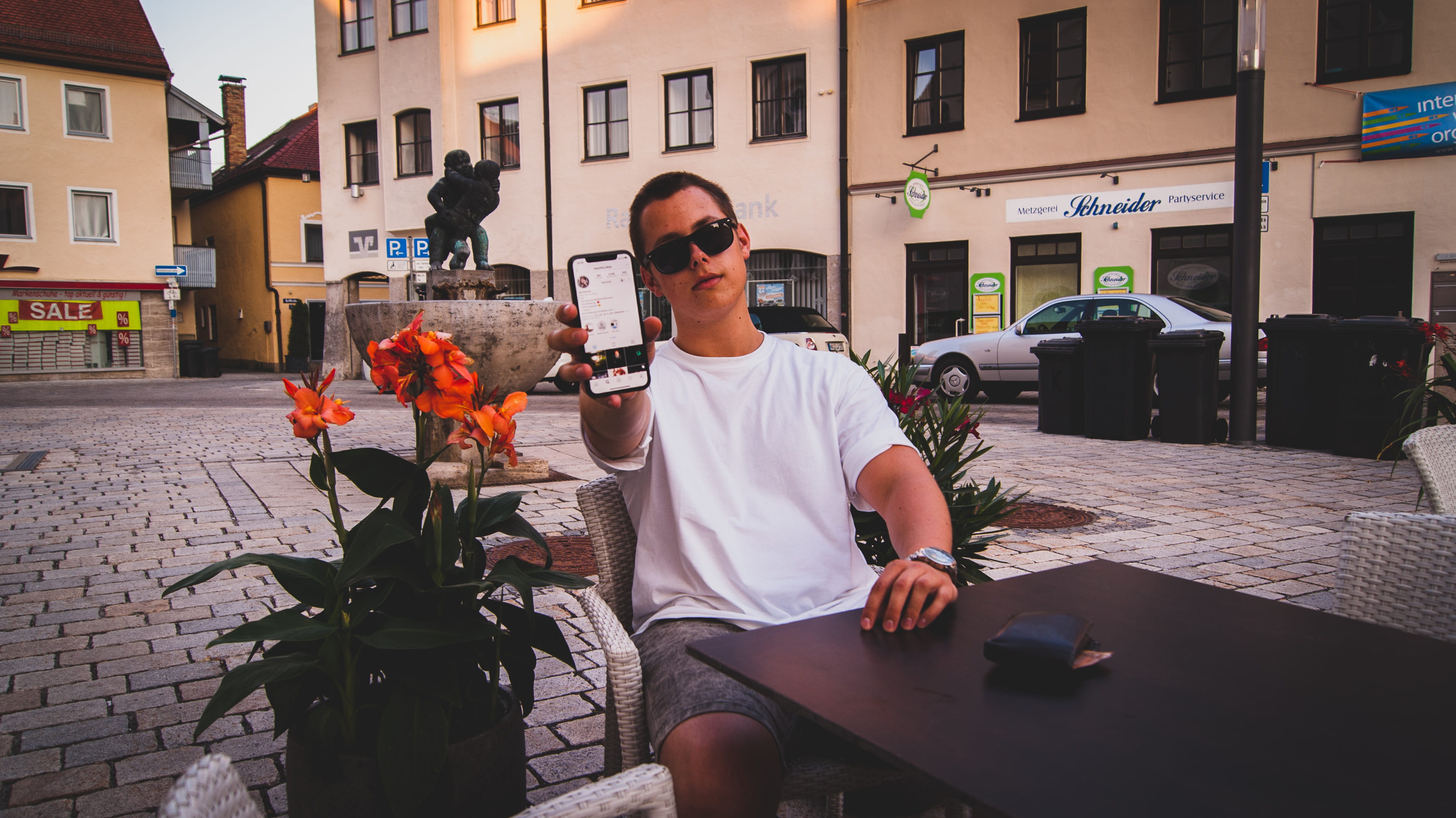 fashion, weilheim in oberbayern, sitting, 4K, germany, young men, lifestyles, three quarter length, built structure, architecture, day, males, adult, front view, HD Wallpaper
