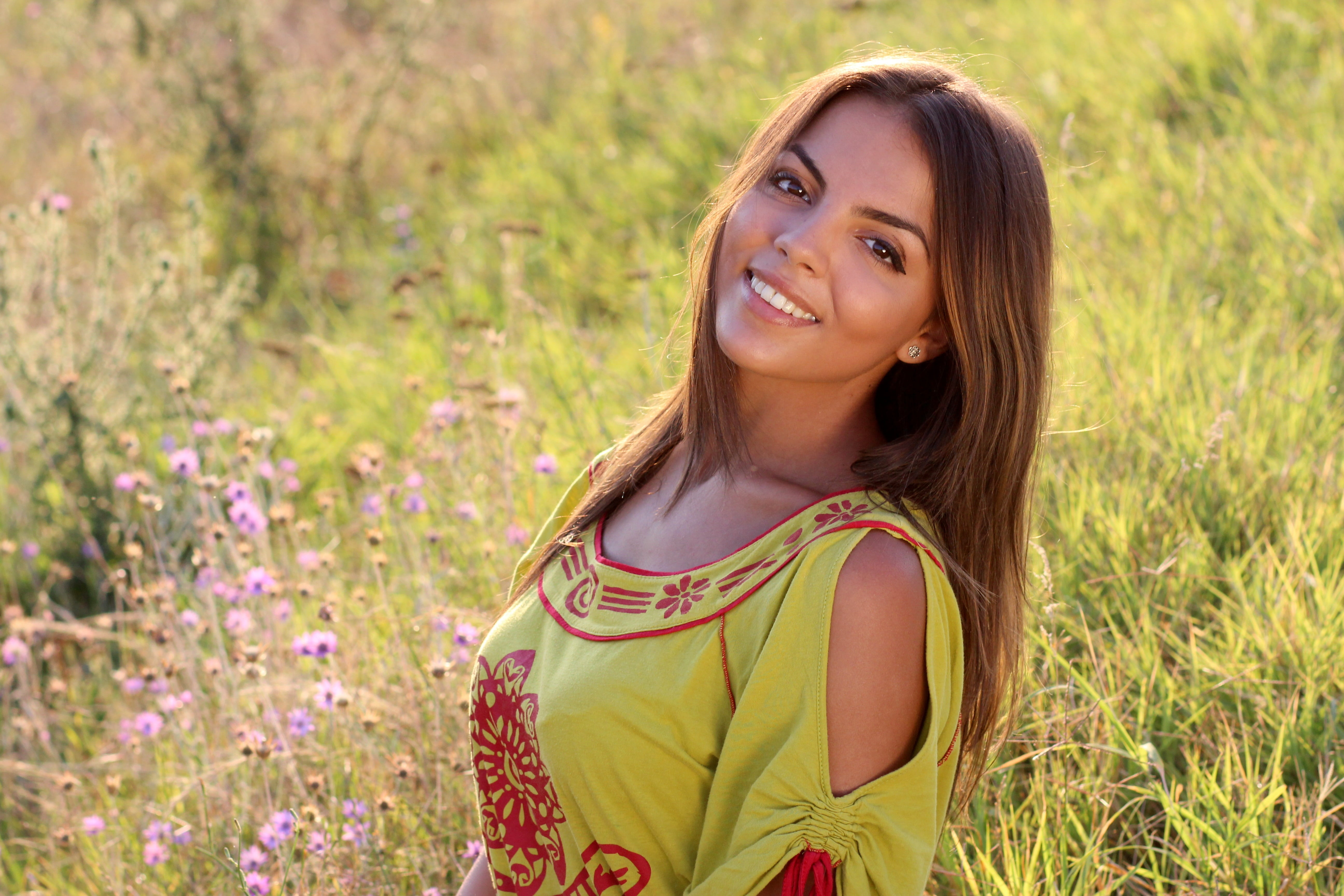 plant, grass, cold, neck, meadow, young women, girl, green, field, hair, emotion, smiling, happiness, summer, beauty, long hair, flower, females, outdoors, HD Wallpaper