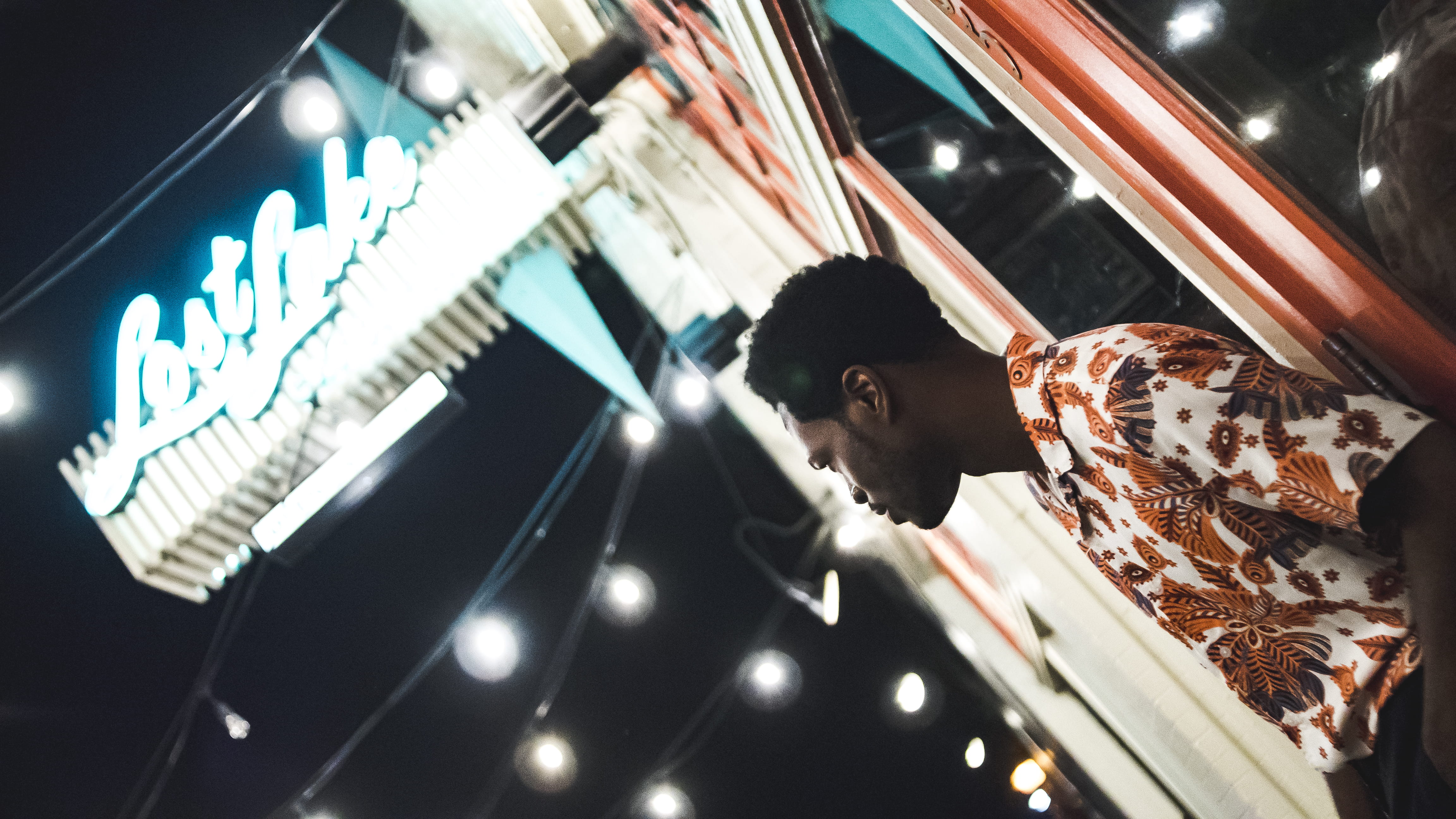 signboard, young adult, waist up, lifestyles, contemplation, men, young men, one person, lost, low angle view, man, 4K, light - natural phenomenon, illuminated, HD Wallpaper