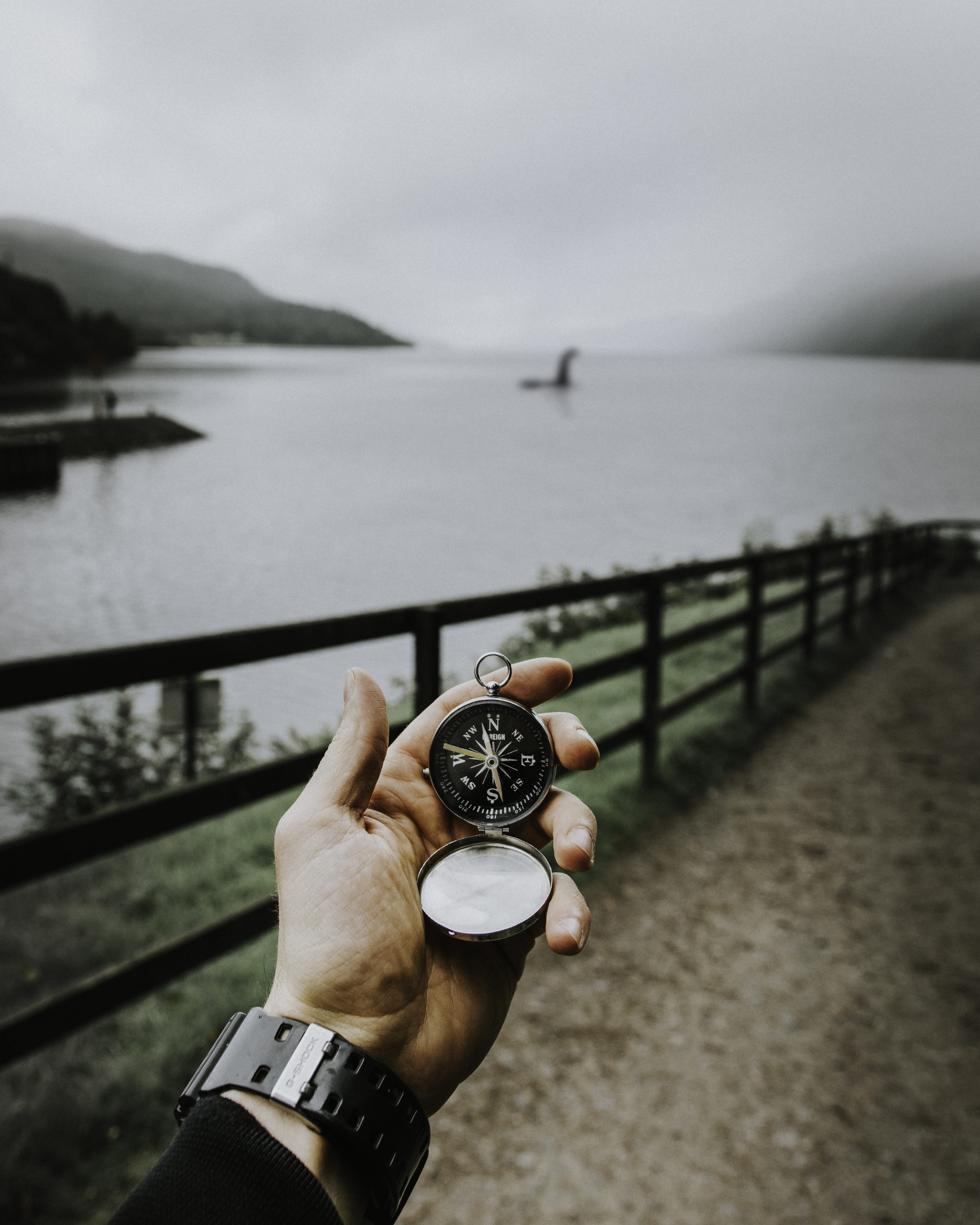 lost, finger, day, wander, lifestyles, loch, wanderlust, scotland, personal perspective, ness, focus on foreground, water, sea, one person, human body part, Phone HD Wallpaper