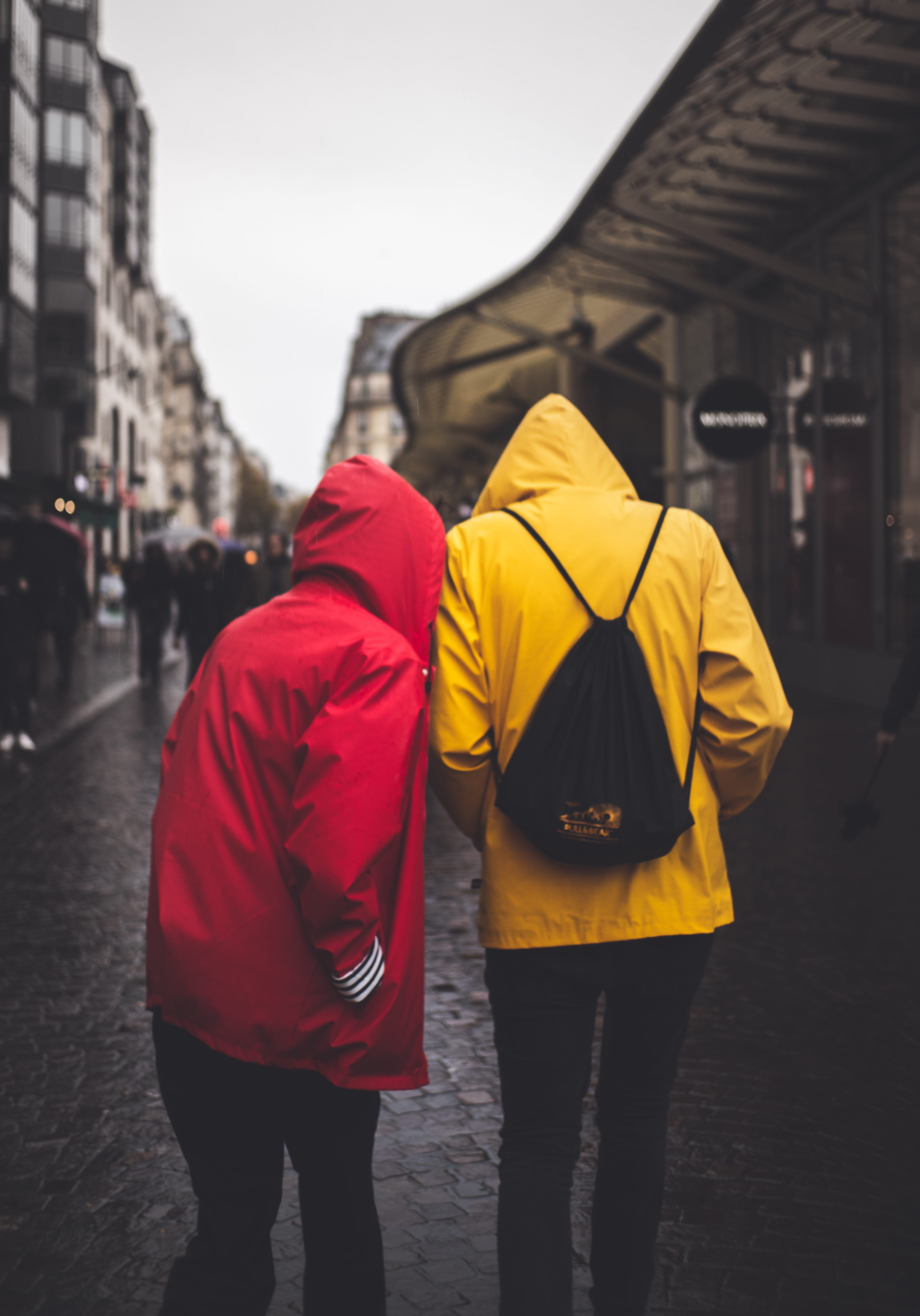 two, jacket, rear view, france, soft, outdoors, city life, road, human, hood, red, yellow, apparel, vibrant, city, building exterior, clothing, middle, Phone HD Wallpaper