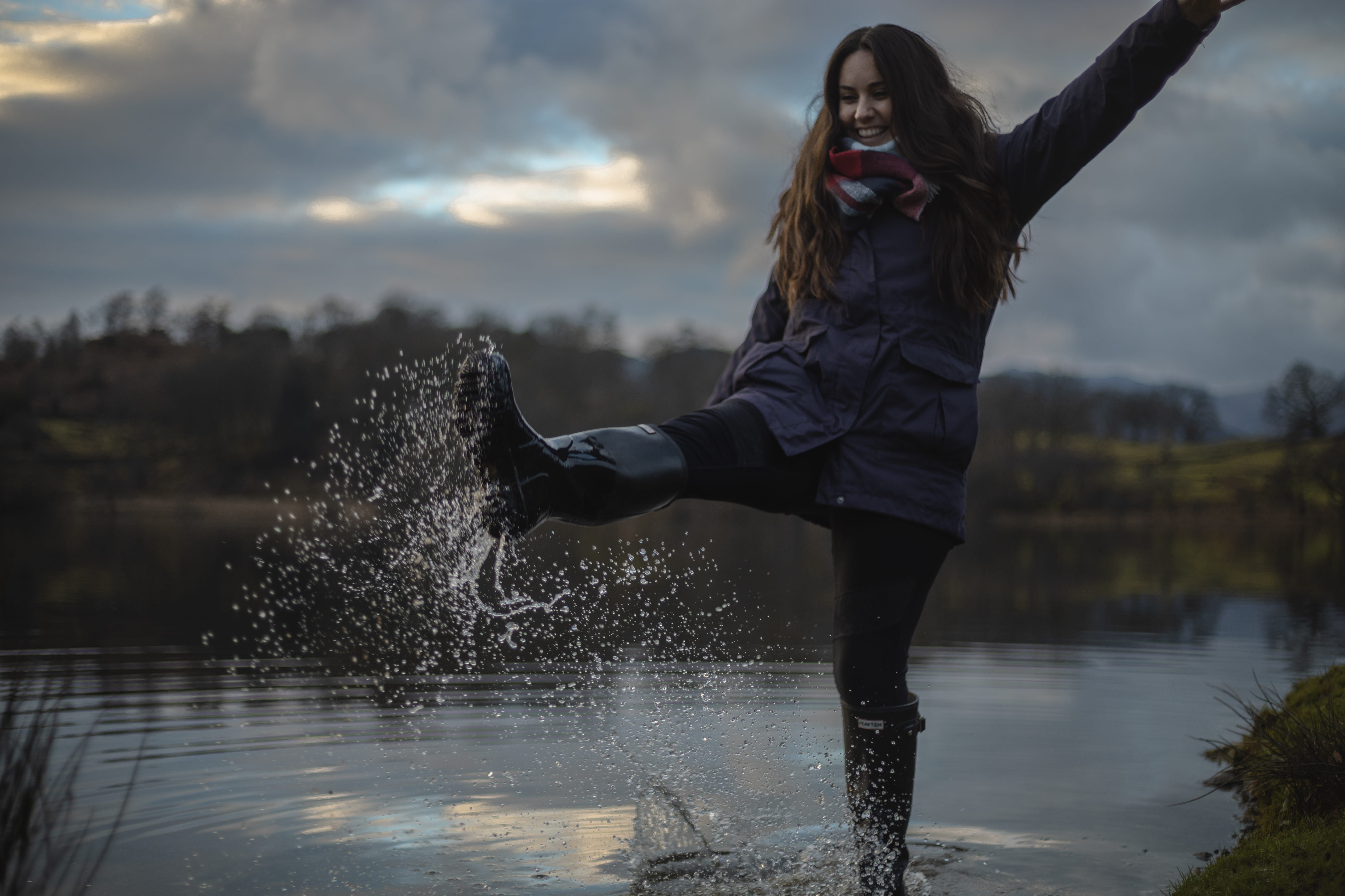 leisure activity, hunter boots, freedom, enjoyment, cloud - sky, pants, human arm, hair, wellington boots, outdoors, lake, woman, one person, cumbria, human, HD Wallpaper