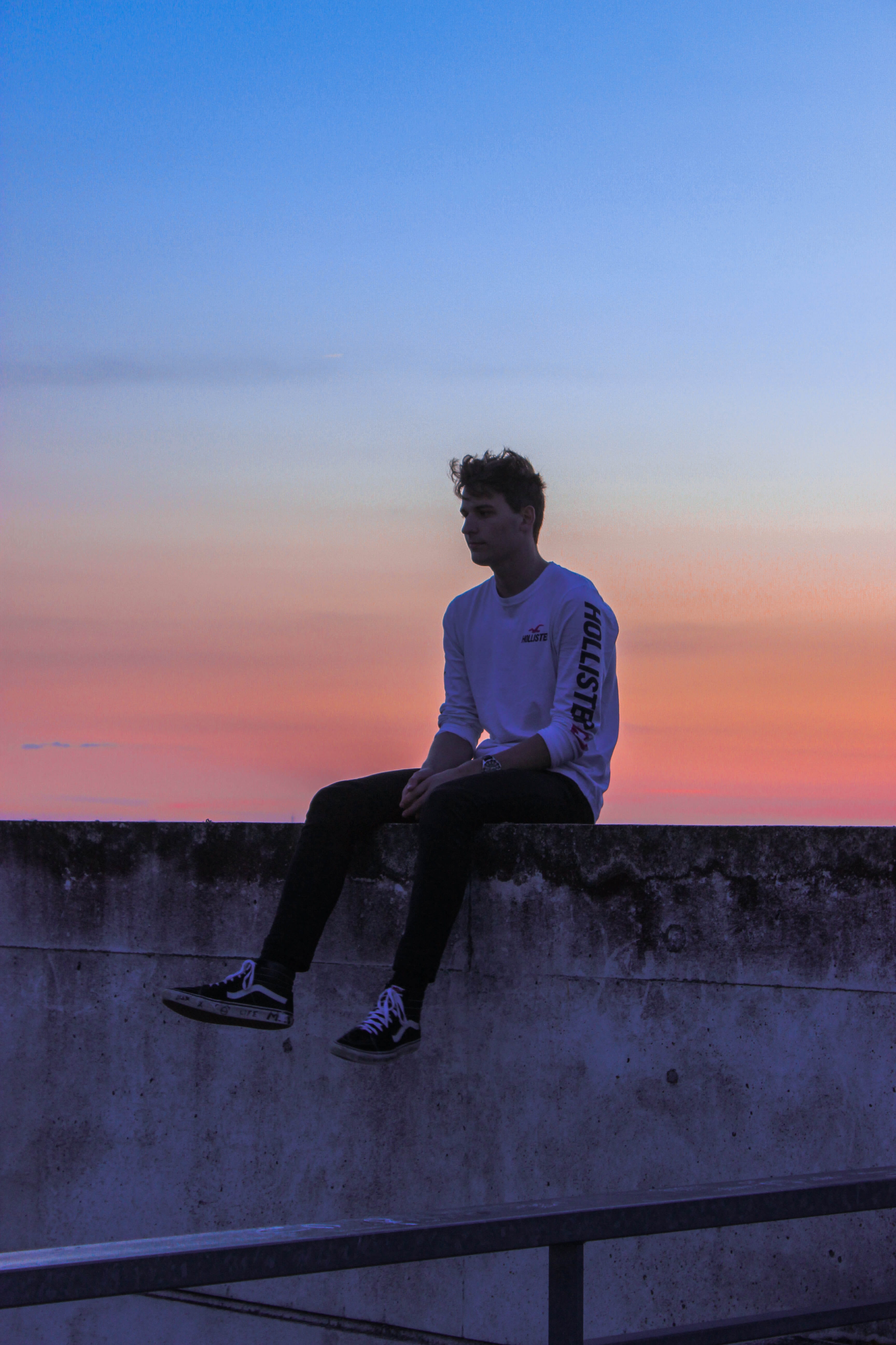 street, footwear, sleeve, sunset, reflection, 5K, relaxation, lifestyles, architecture, person, sky, retaining wall, men, unknown, outdoors, human, apparel, Phone HD Wallpaper