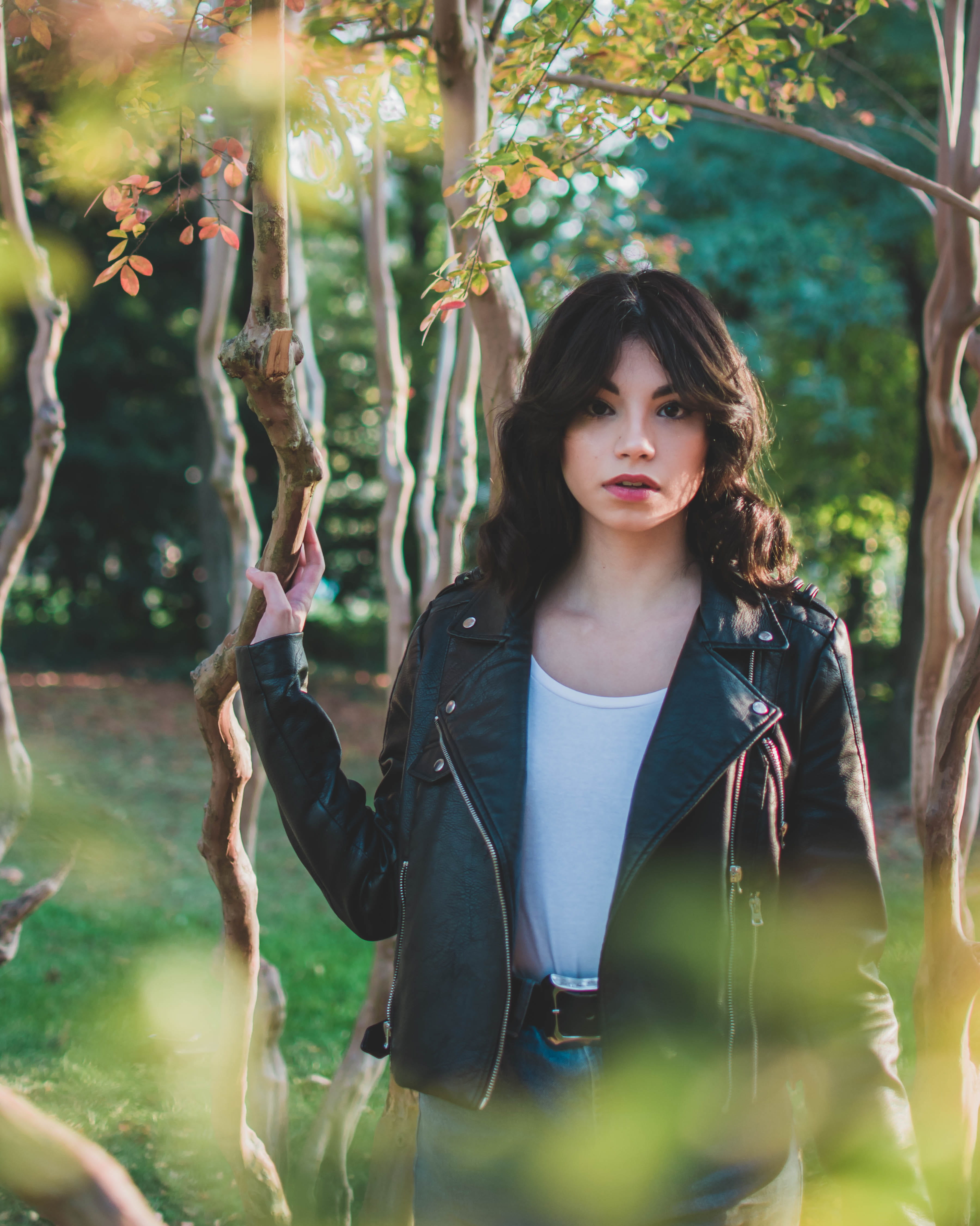 casual clothing, girl, 4K, sleeve, tree, leafed, woman, young women, woman in a forest, long sleeve, jacket, standing, long hair, nature, giardini margherita, Phone HD Wallpaper