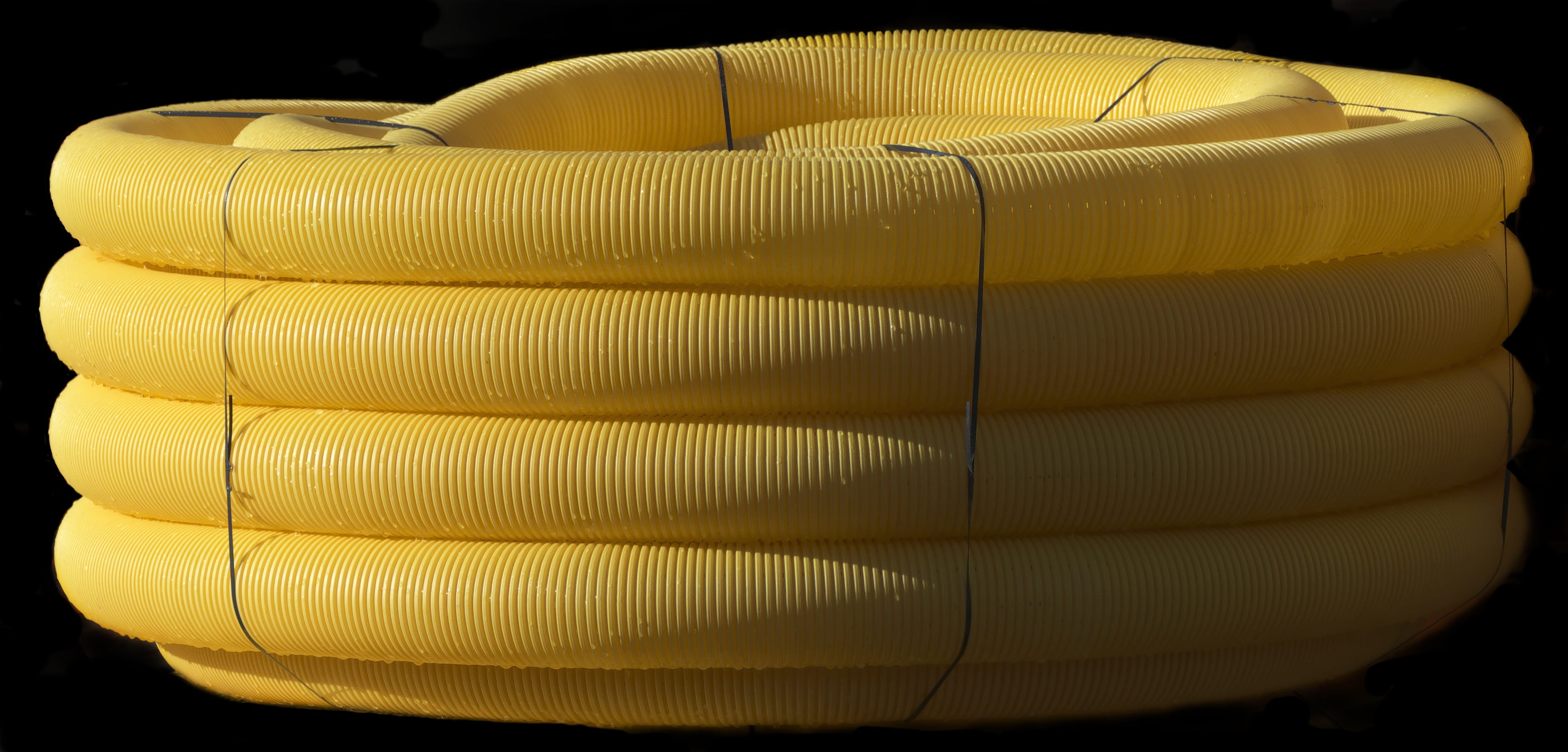 arts culture and entertainment, food and drink, drain pipe, yellow, spirituality, indoors, construction industry, studio shot, coiled, black background, HD Wallpaper