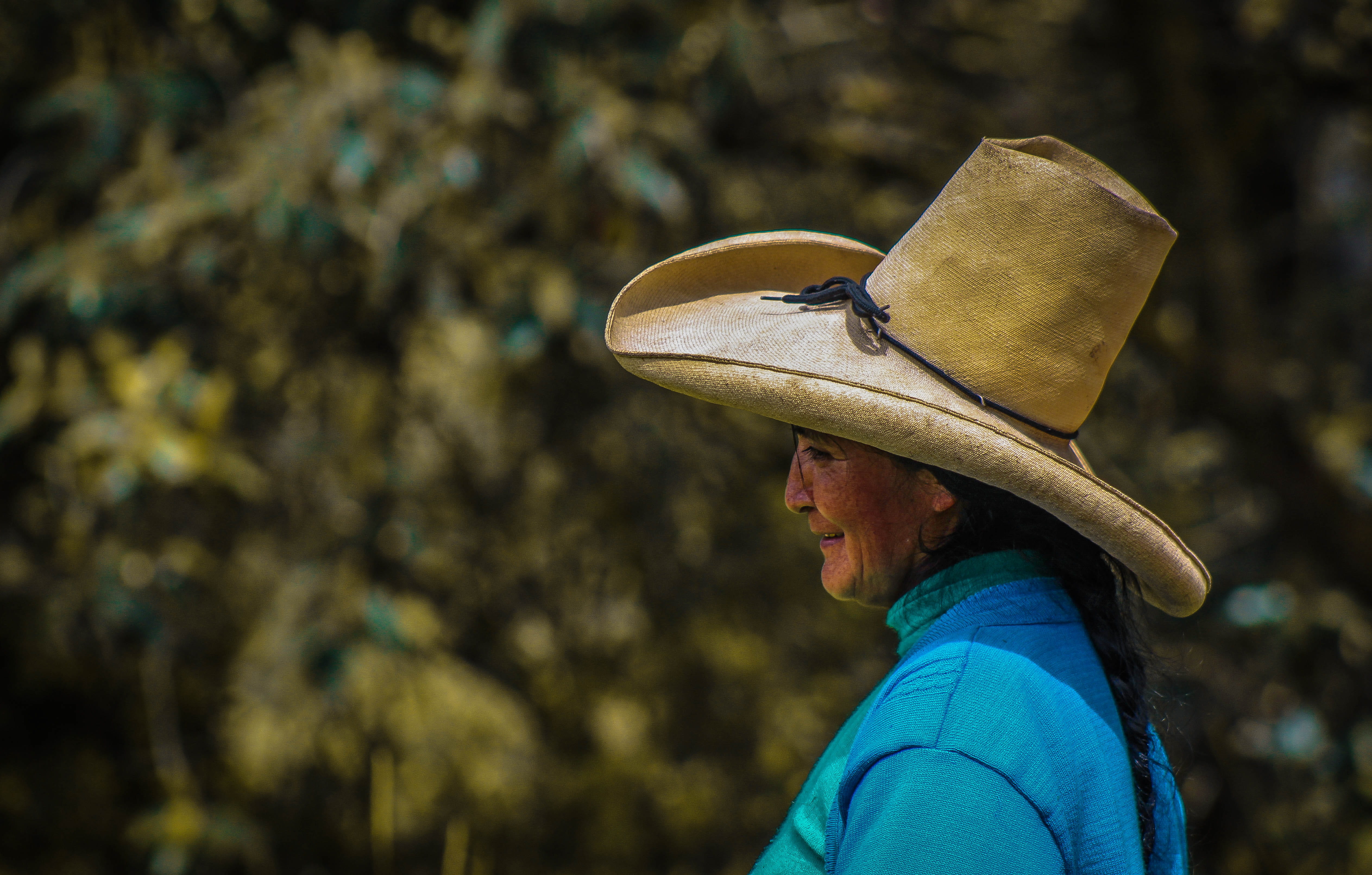 side view, perú, headshot, profile view, cowboy hat, coat rack, facing, adult, outdoors, farmer, boot, mujer de granja porcón, blue, granja porcón, focus on foreground, HD Wallpaper