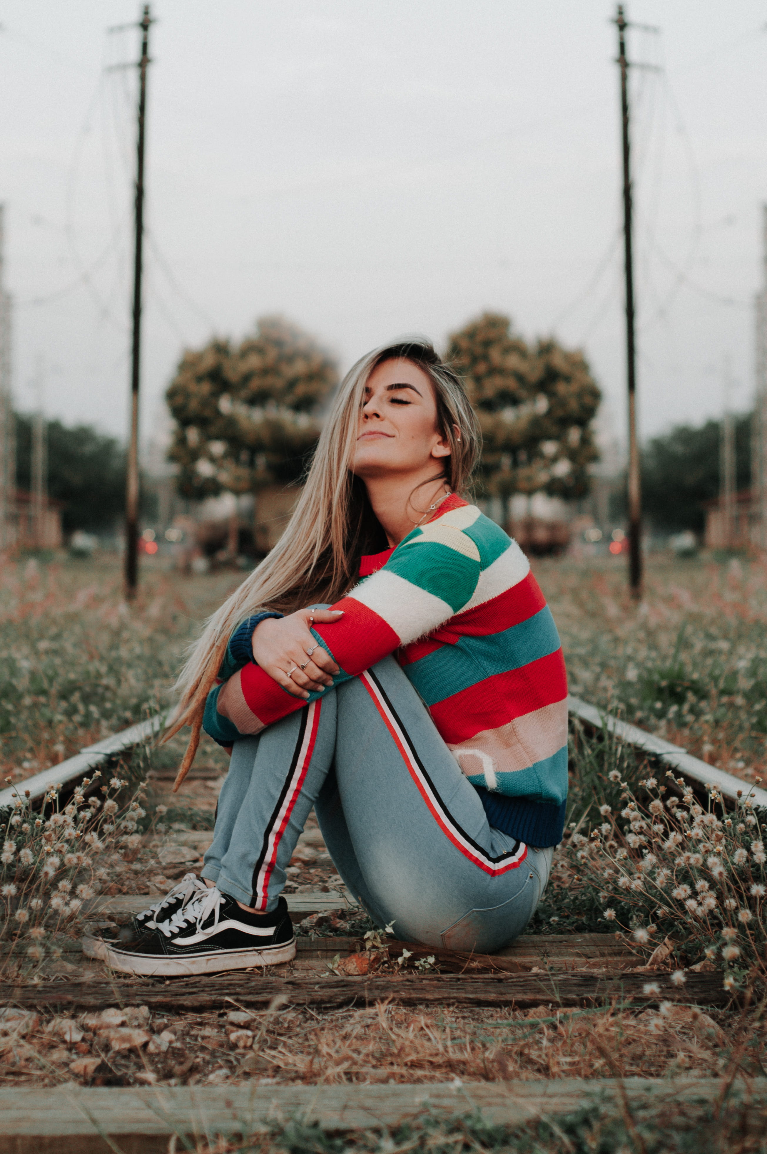 lifestyle, one person, 4K, daylight, casual clothing, sitting, pretty, recreation, lifestyles, contemplation, hair, smile, women, pose, girls, long hair, Phone HD Wallpaper
