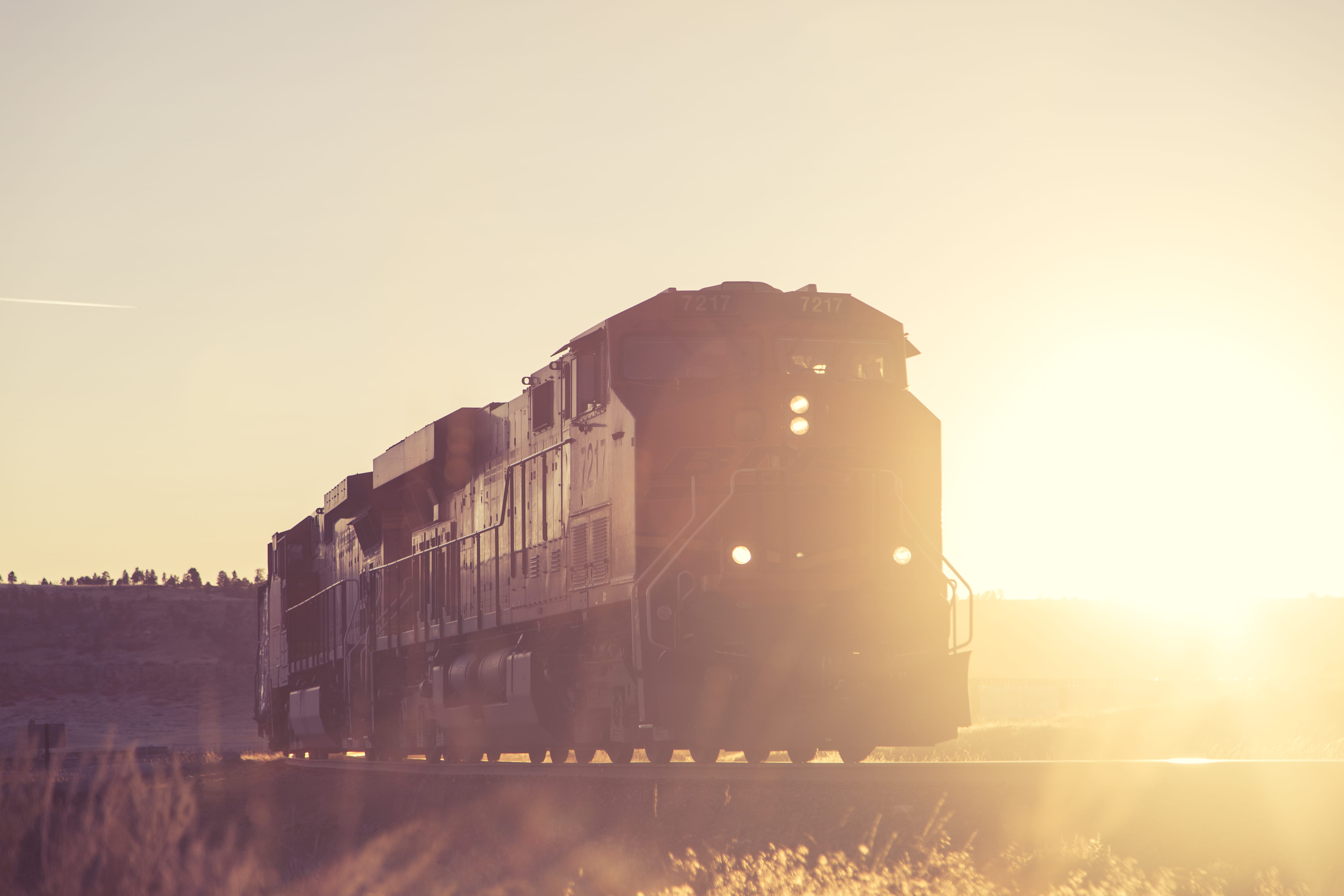 photo, mode of transportation, sun, transportation, train, outdoors, track, built structure, sunset, 5K, copy space, building exterior, train - vehicle, HD Wallpaper