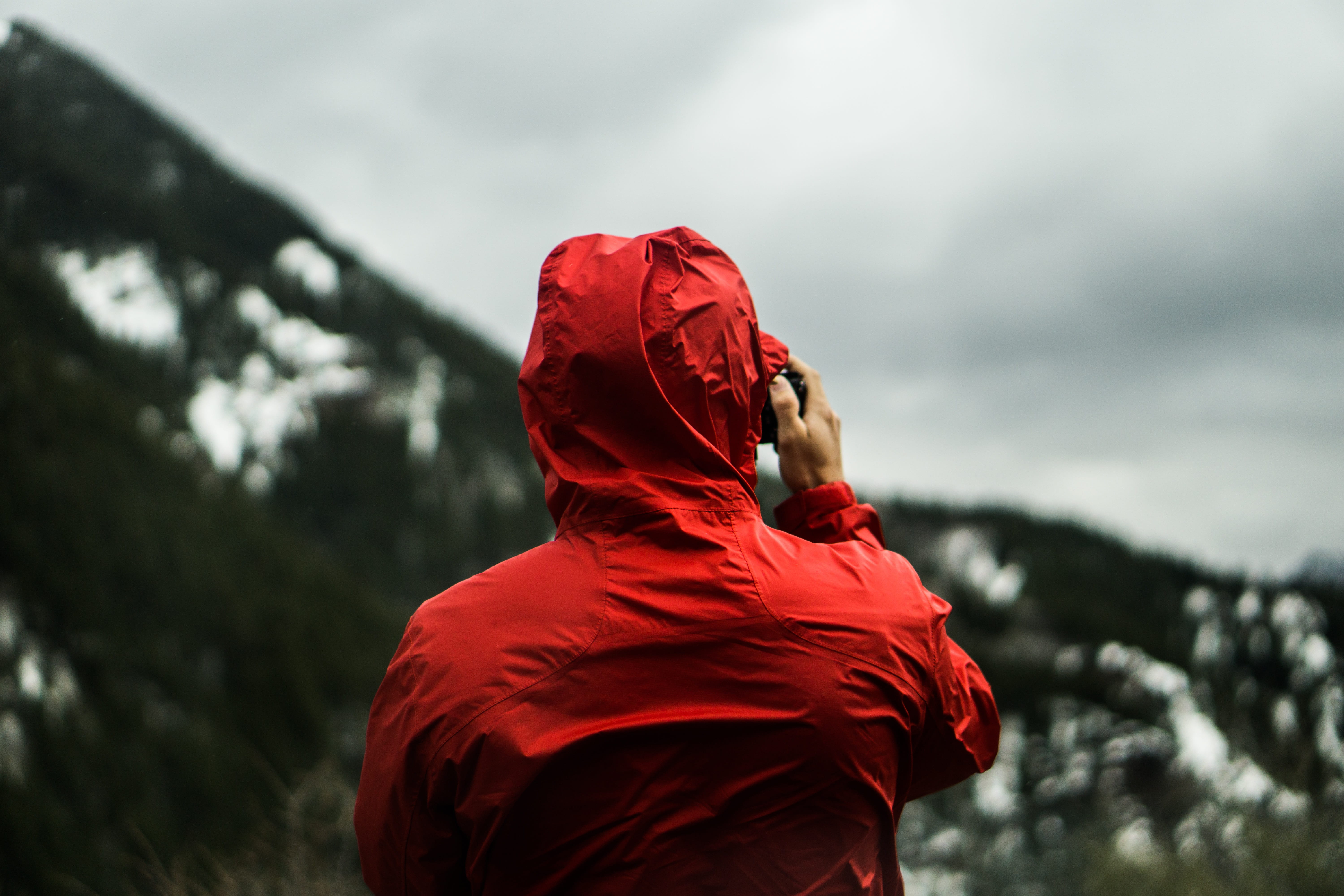 red, rain, cloud - sky, hood, young adult, headshot, mountain, portrait, people, clothing, sky, focus on foreground, hood - clothing, outdoor, waist up, HD Wallpaper