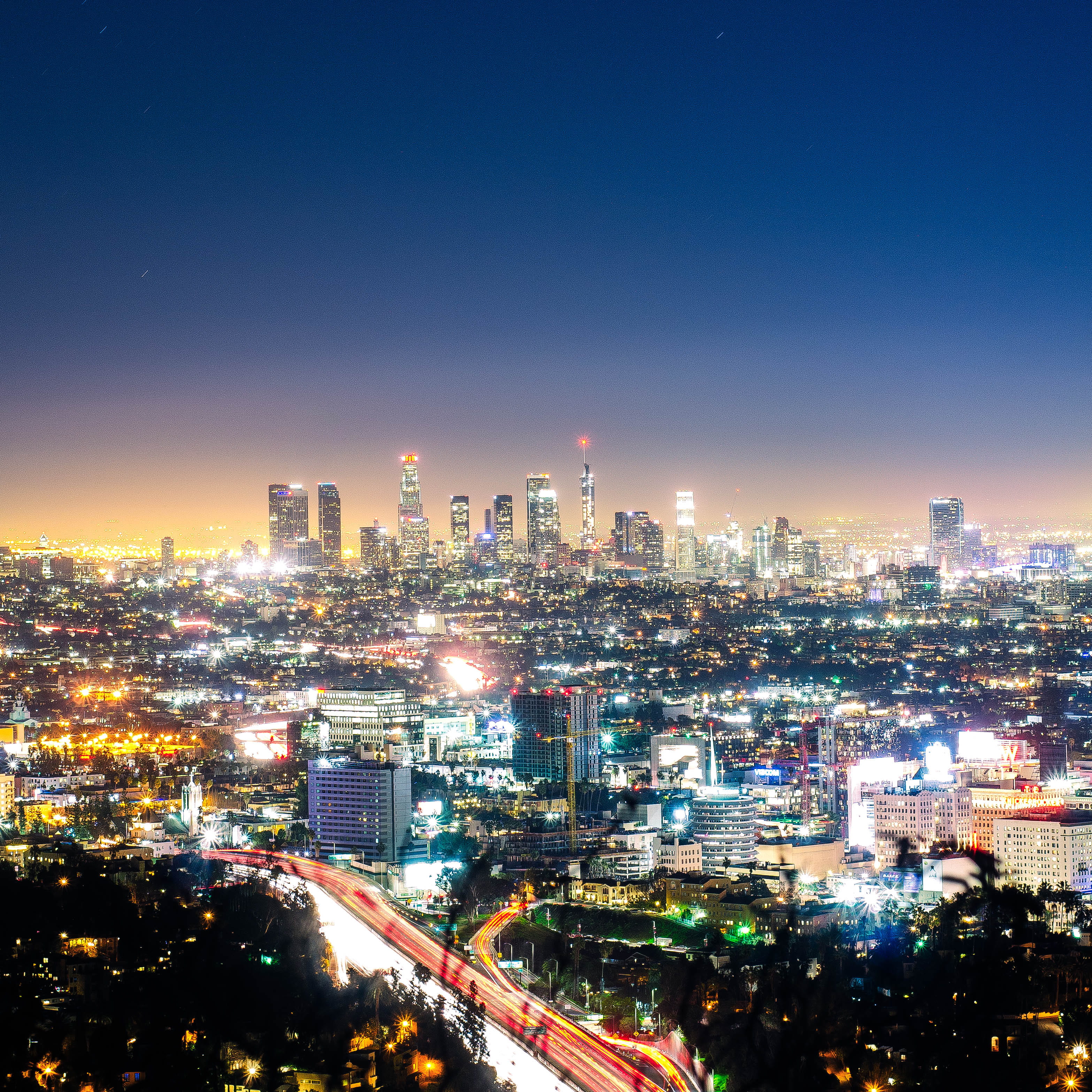urban skyline, illuminated, urban, night, viewpoint, buildings, light, rise, outdoors, light trail, building, modern, architecture, skyscraper, landscape, Phone HD Wallpaper