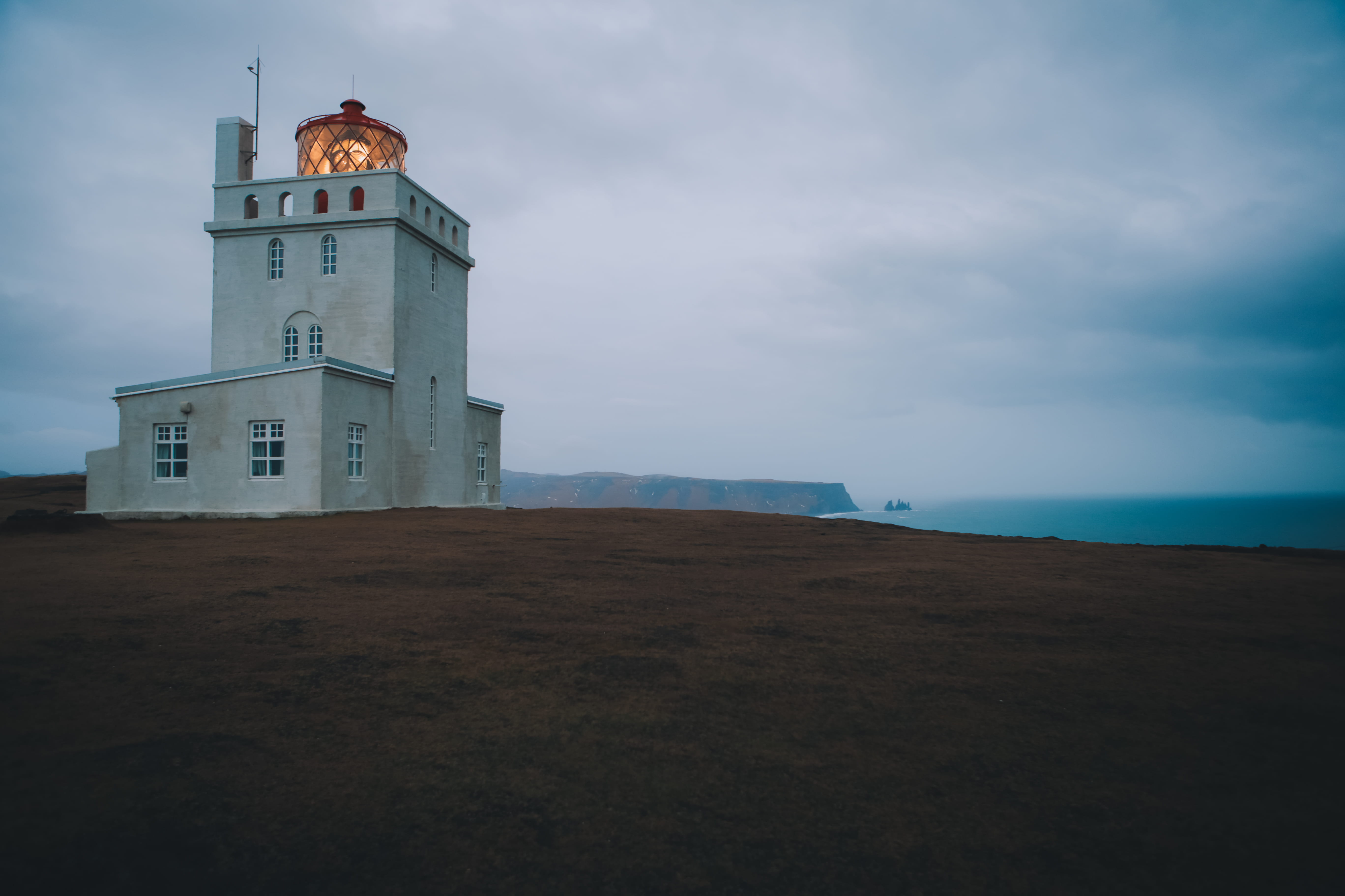 barren, structure, daytime, beach, nature, water, southern iceland, lit, tower, safety, coastal, light, protection, white, cliff, beacon, black sand, architecture, HD Wallpaper