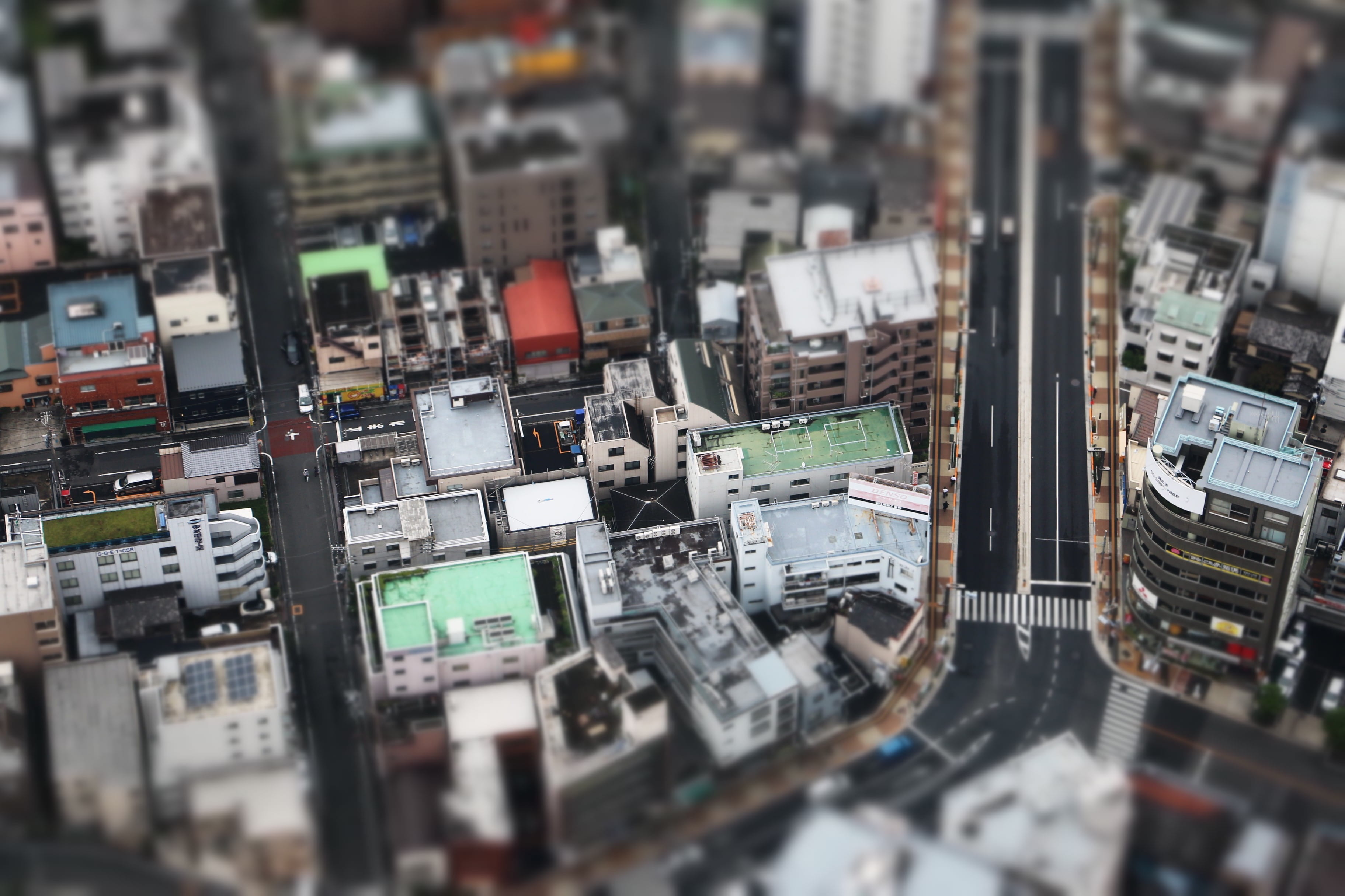 2K, outdoors, no people, aerial, view, cityscape, japan, built structure, tilt-shift, city, miniature, street, office building exterior, residential district, HD Wallpaper