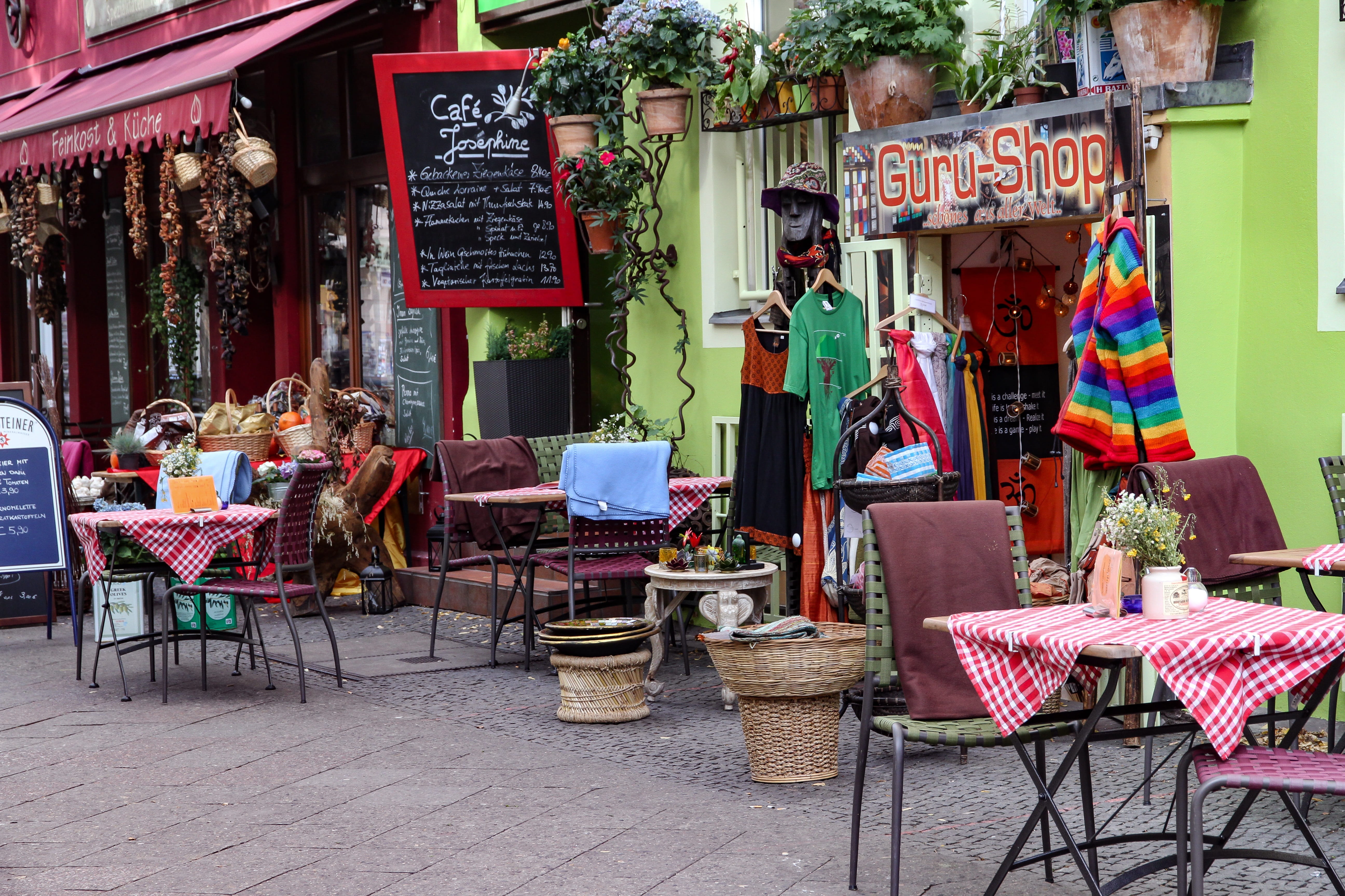 building, business, kreuzberg, table, 5K, communication, text, no people, retail, cafe, retail display, market, western script, outdoors, restaurant, seat, HD Wallpaper