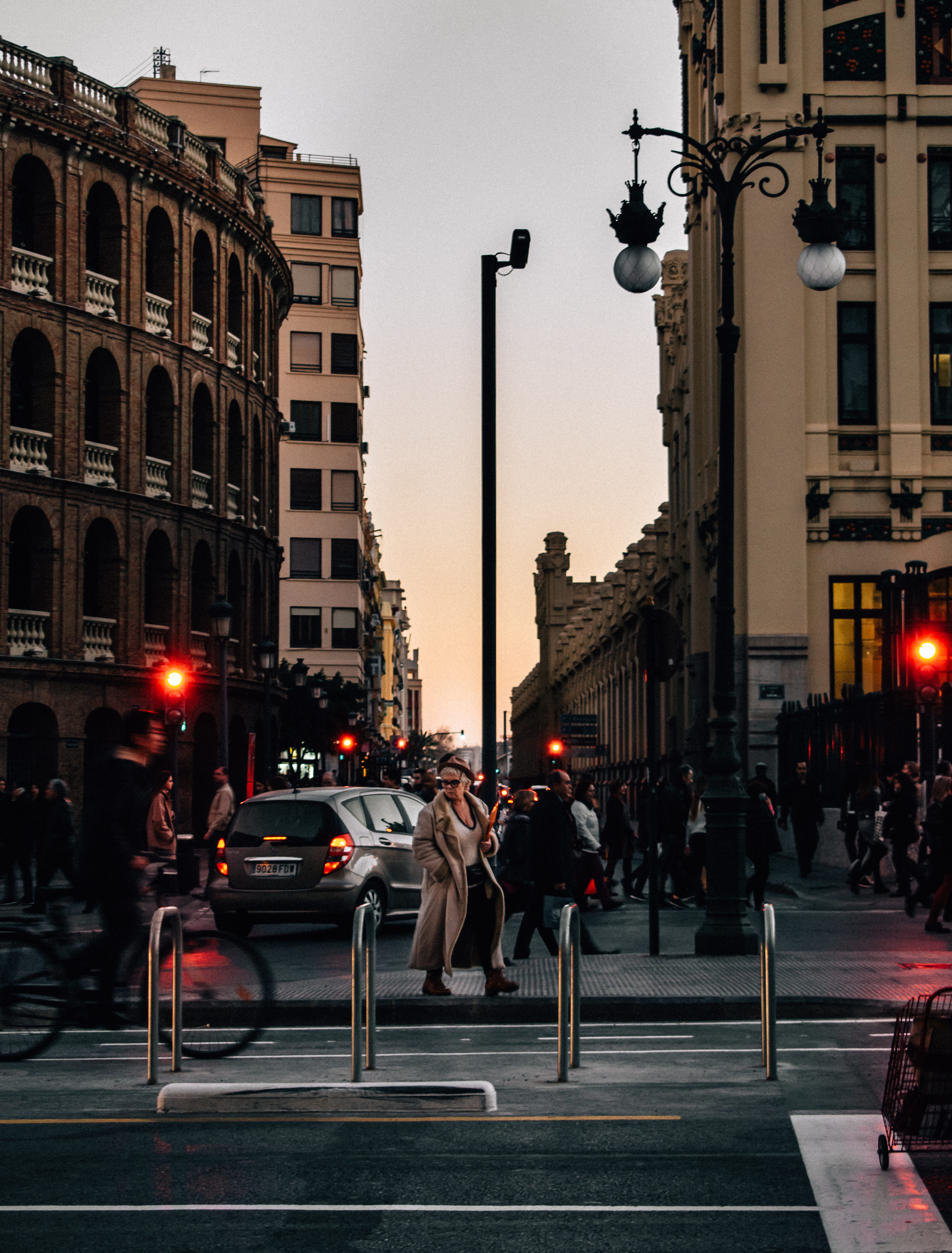 city, lantern, spain, real people, architecture, person, streetscape, walking, valencium, street light, luxofor, woman, illuminated, bullring, city street, Phone HD Wallpaper