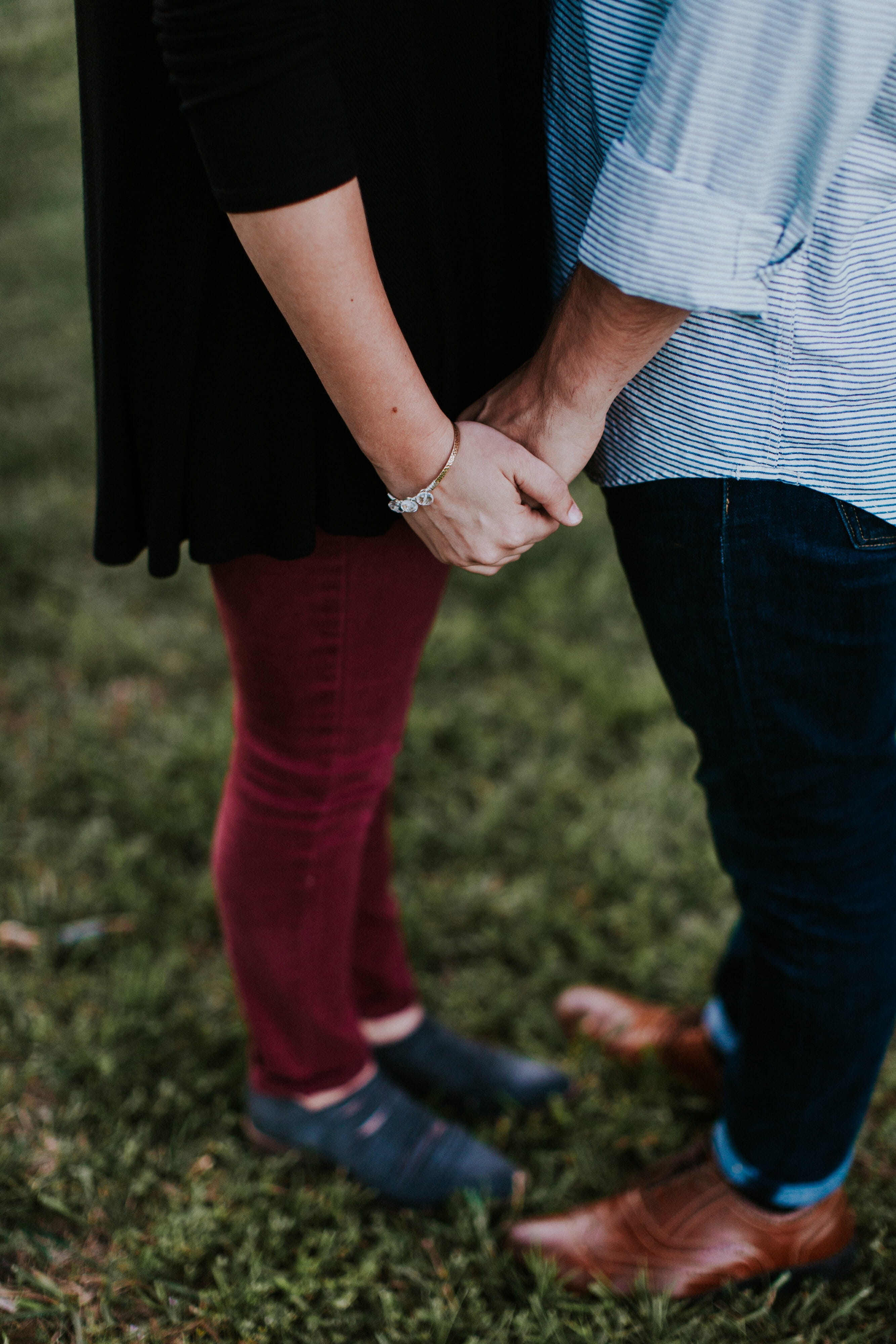 two People, grass, human leg, real people, human body part, positive emotion, emotion, bonding, couple - Relationship, leisure activity, hand, low section, Phone HD Wallpaper