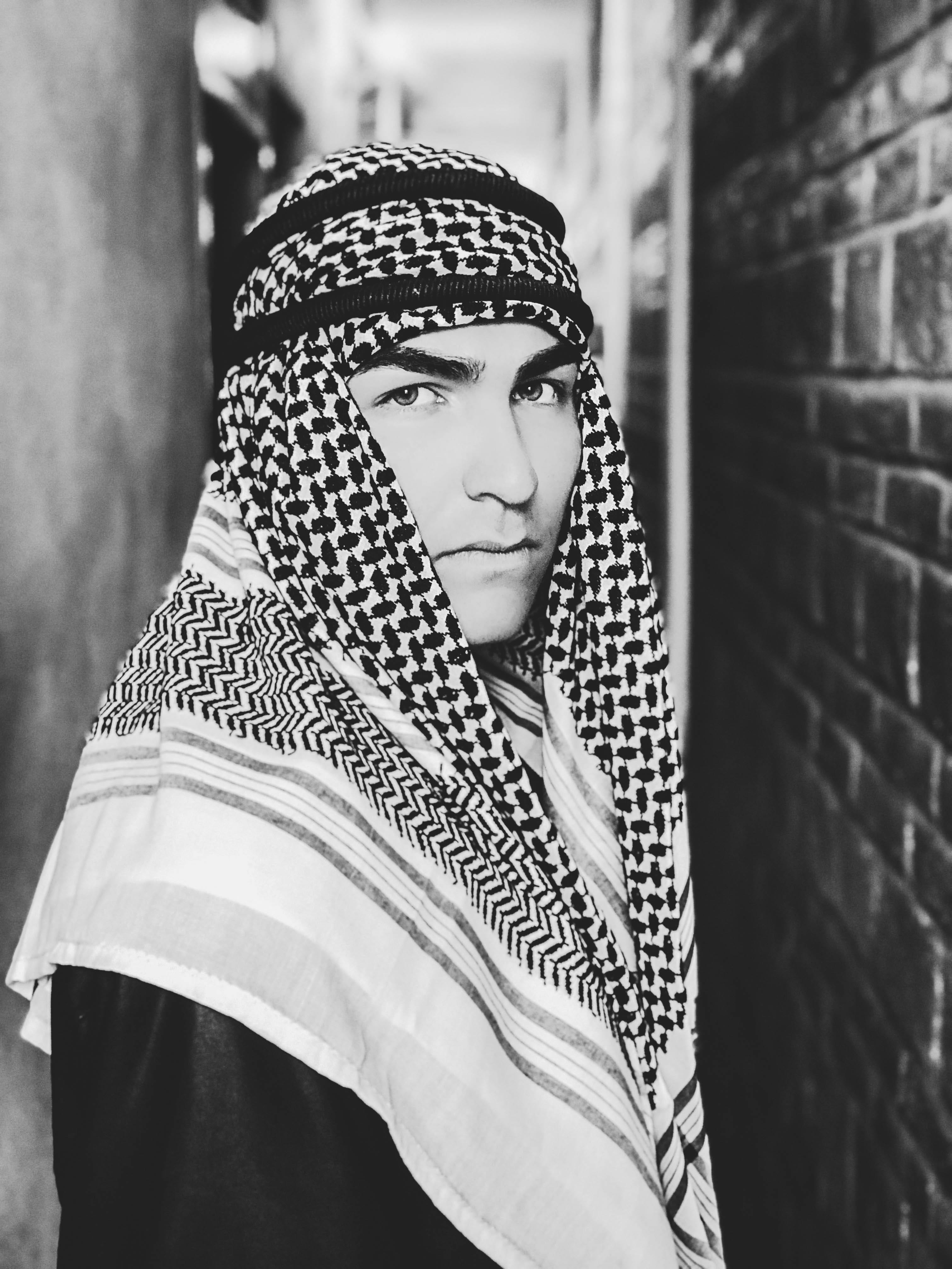 clothing, casual clothing, warm clothing, model, young adult, standing, young, focus on foreground, day, front view, facial expression, lifestyles, arabic, Phone HD Wallpaper