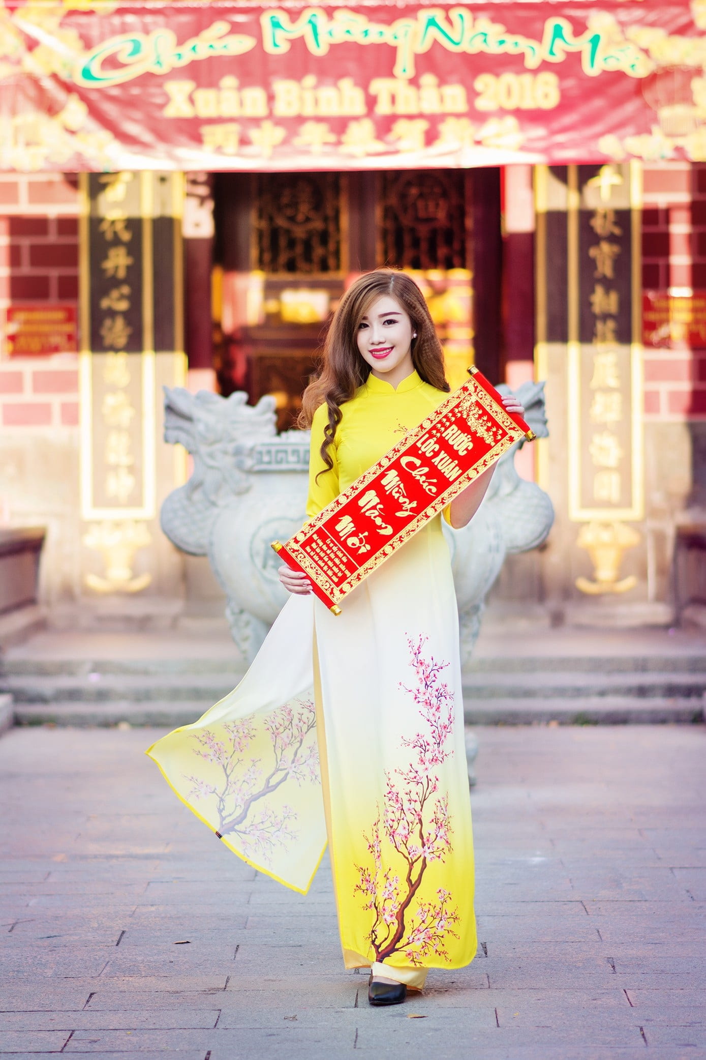 hairstyle, yellow skirt, happiness, looking at camera, outdoors, clothing, people of vietnam, leisure activity, smiling, young adult, women, 1080P, adult, Phone HD Wallpaper