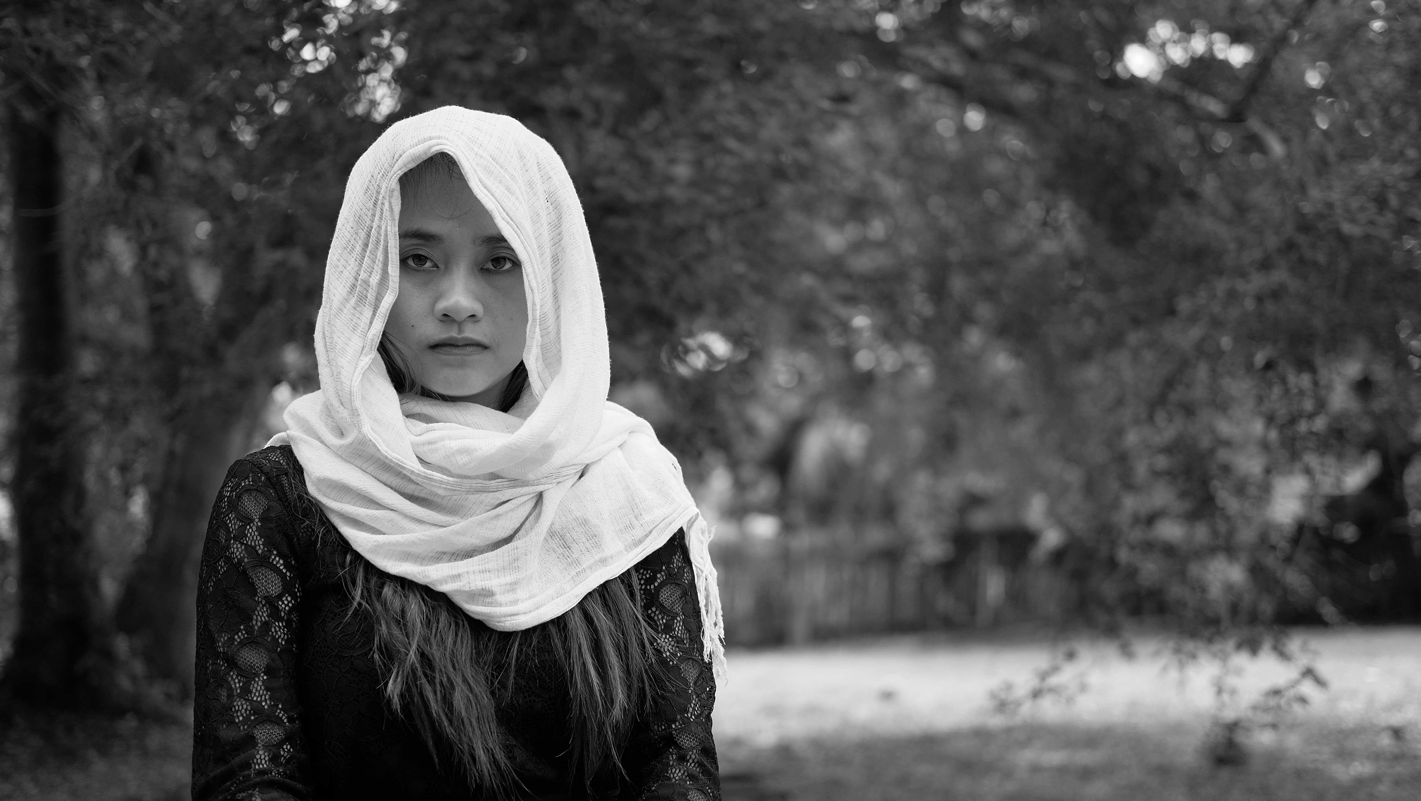 abaya, person, grayscale, one person, facial expression, young adult, outdoors, land, women, sadness, day, front view, looking at camera, beautiful, near, HD Wallpaper