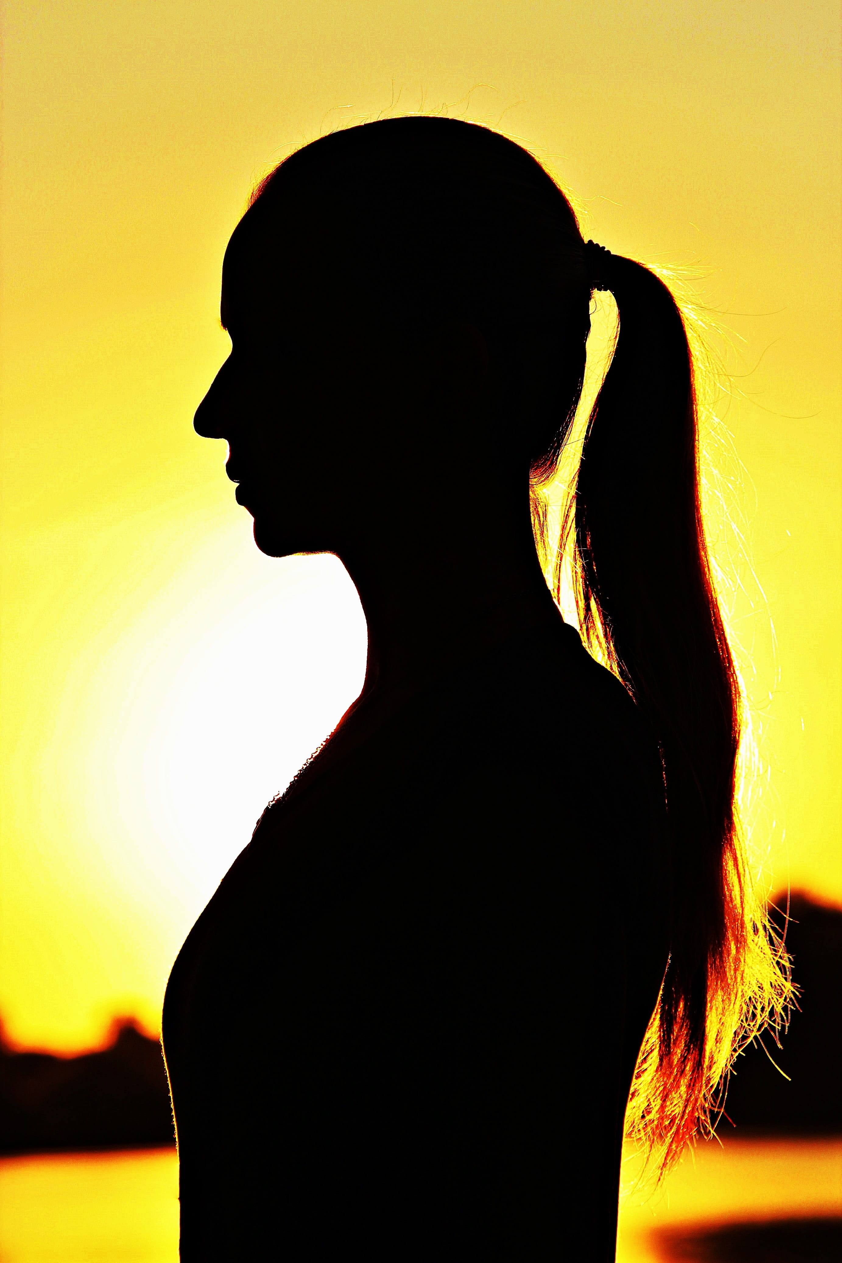 sunset, sunrise, lifestyles, close-up, only women, Plait, studio shot, standing, portrait, yellow, profile view, one woman only, hairstyle, Woman, adult, Phone HD Wallpaper