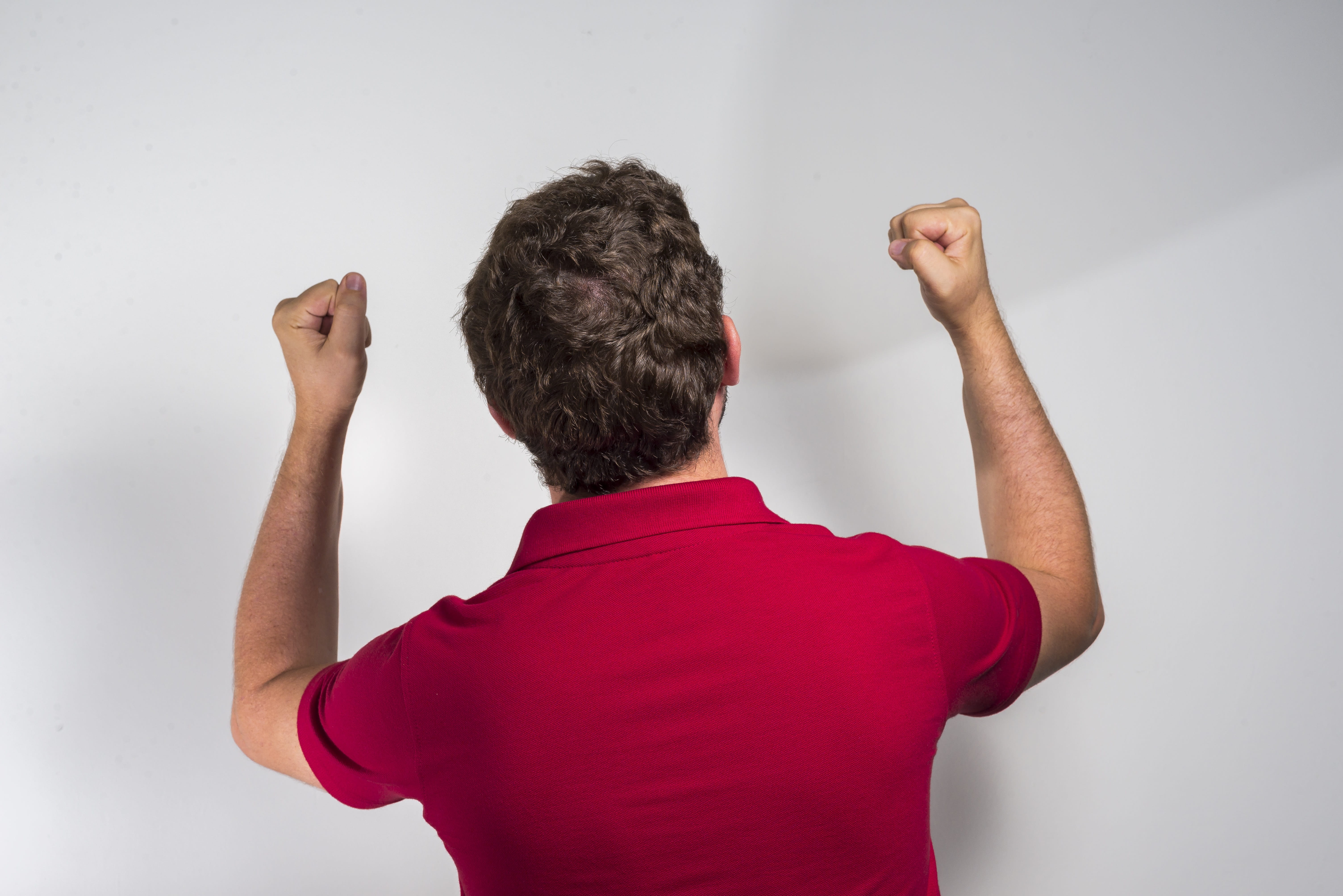 celebration, rear view, gesturing, one person, man, football, real people, men, arms raised, red, wall - building feature, adult, white background, hand raised, HD Wallpaper