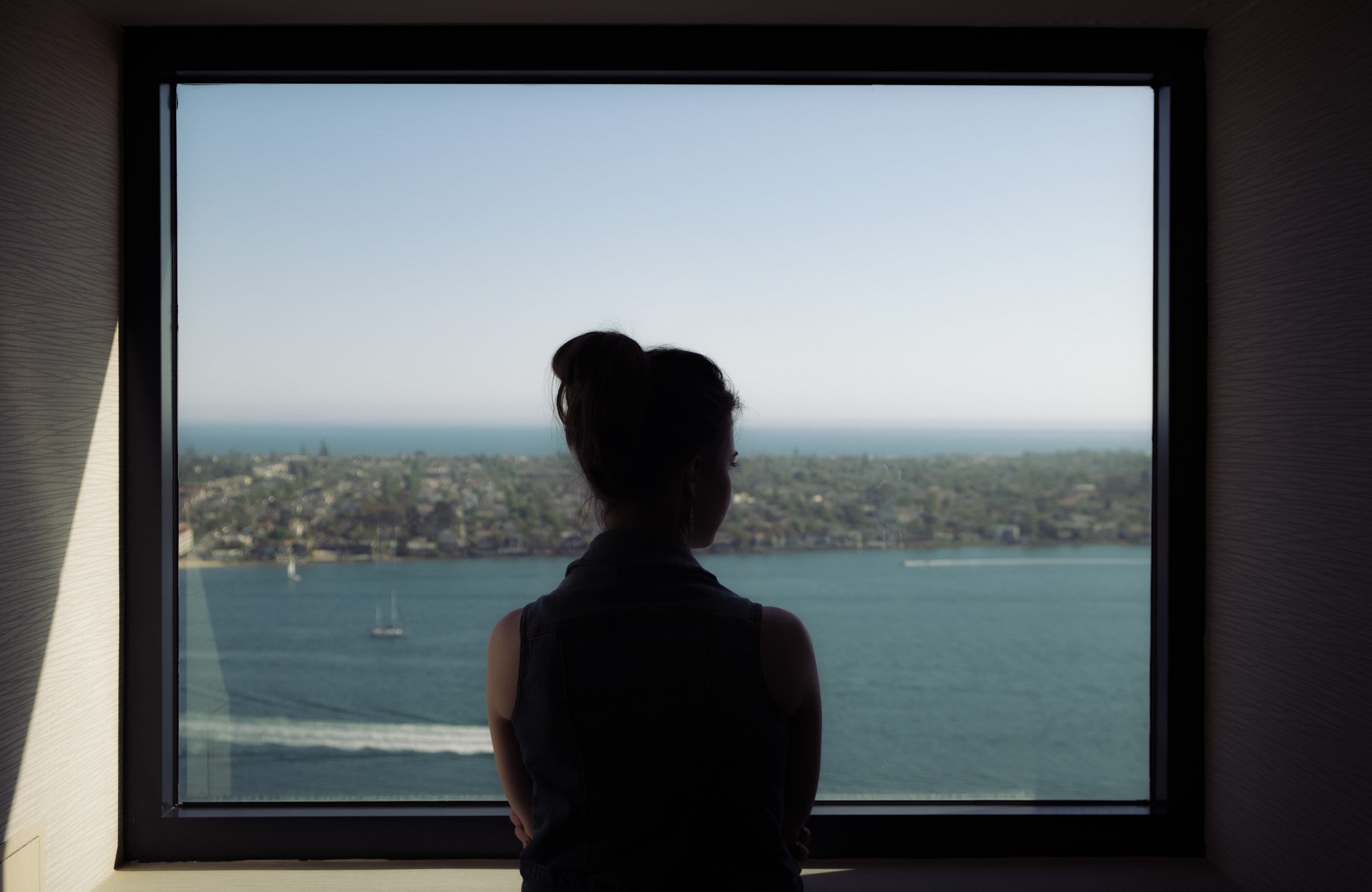 beside, looking At View, woman, clear sky, women, wearing, lifestyles, woman in black, 4K, indoors, dress, watching, water, looking, one Person, horizon, HD Wallpaper