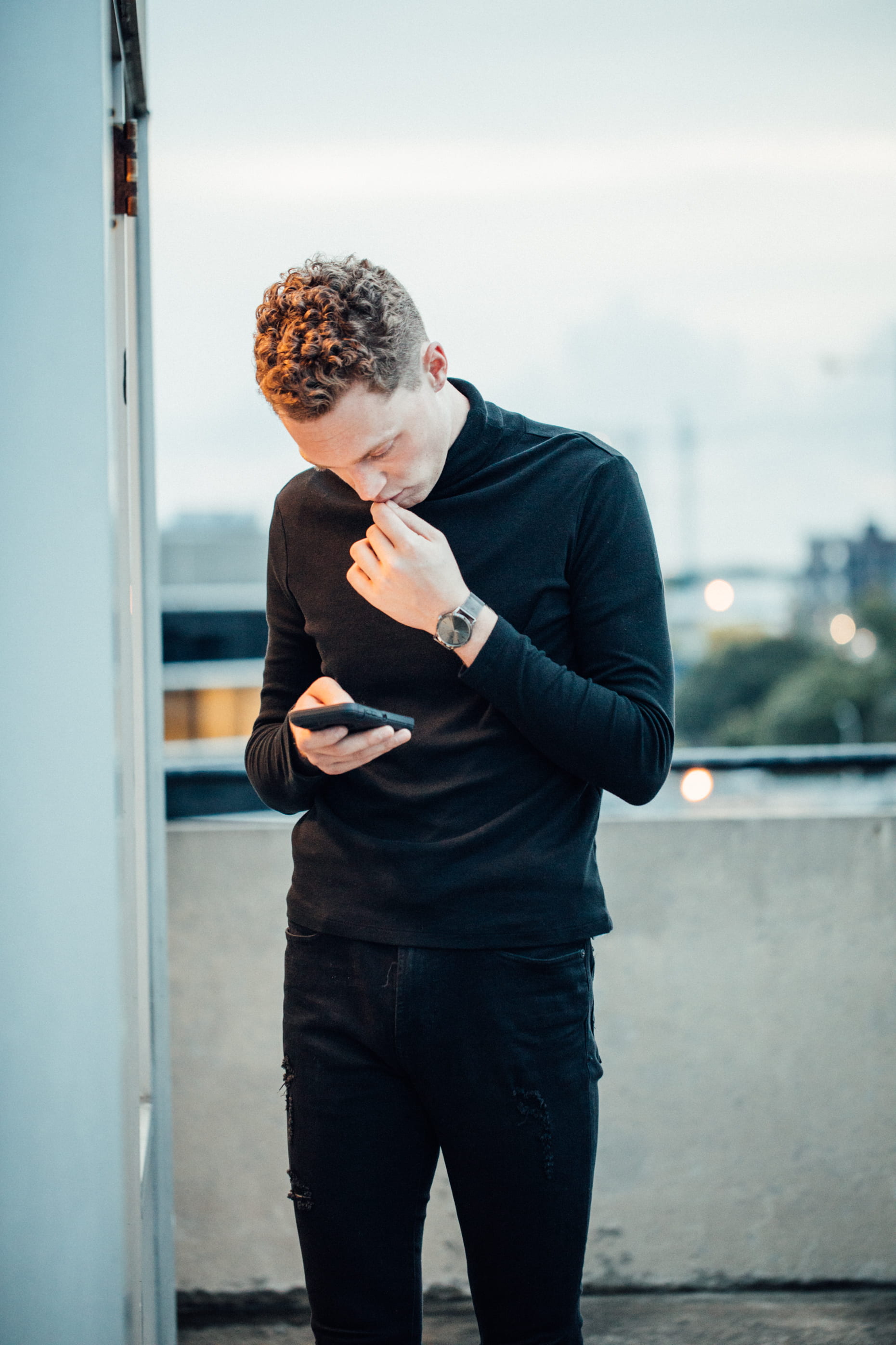lifestyles, looking, moody, hairstyle, young men, street style, thinking, dusk, contemplation, texting, one person, street wear, gloomy, day, standing, Phone HD Wallpaper