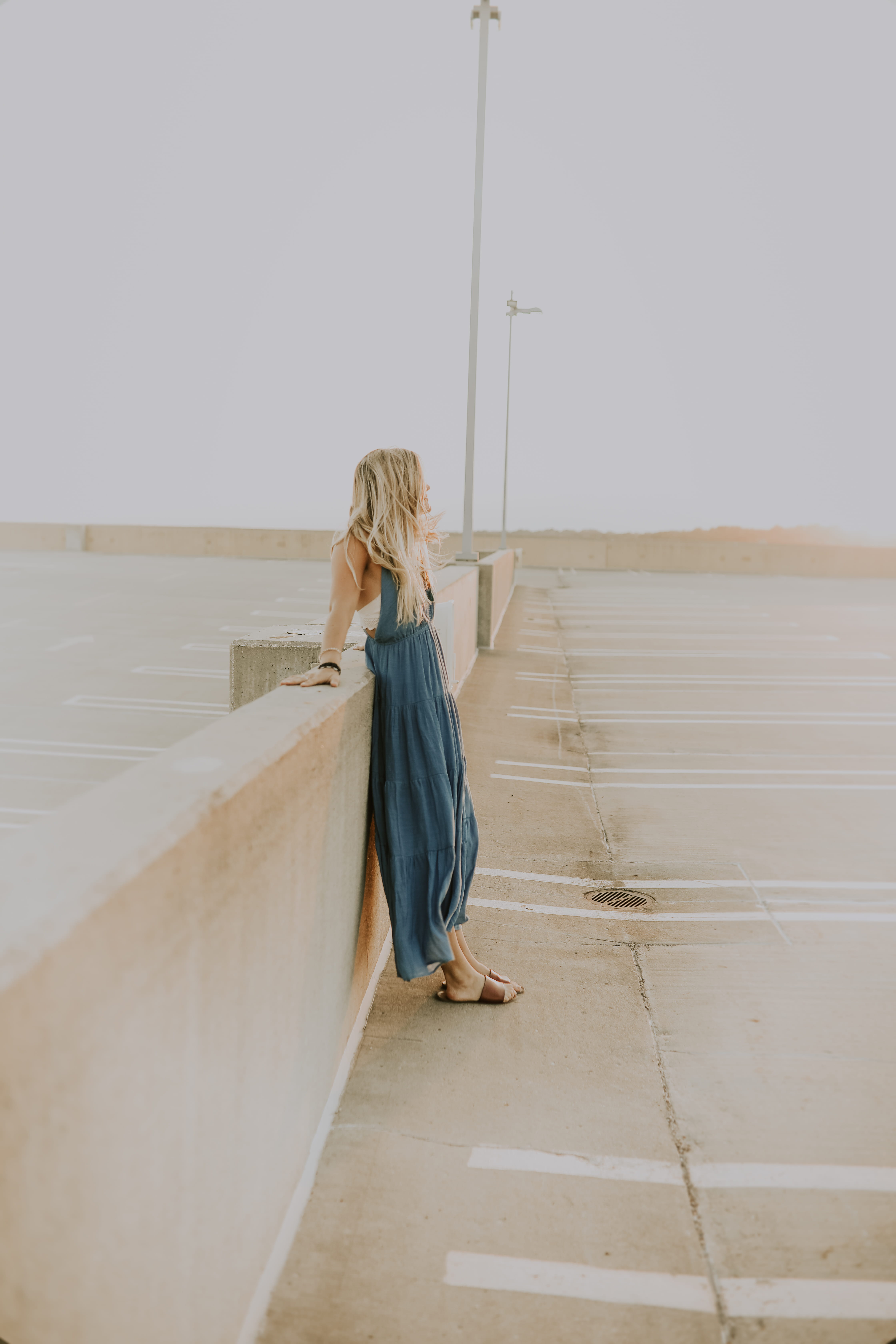 architecture, hair, downtown, hairstyle, summer, wood, adventure, leisure activity, leaning, sunset, 5K, full length, one person, rear view, sleeve, apparel, Phone HD Wallpaper