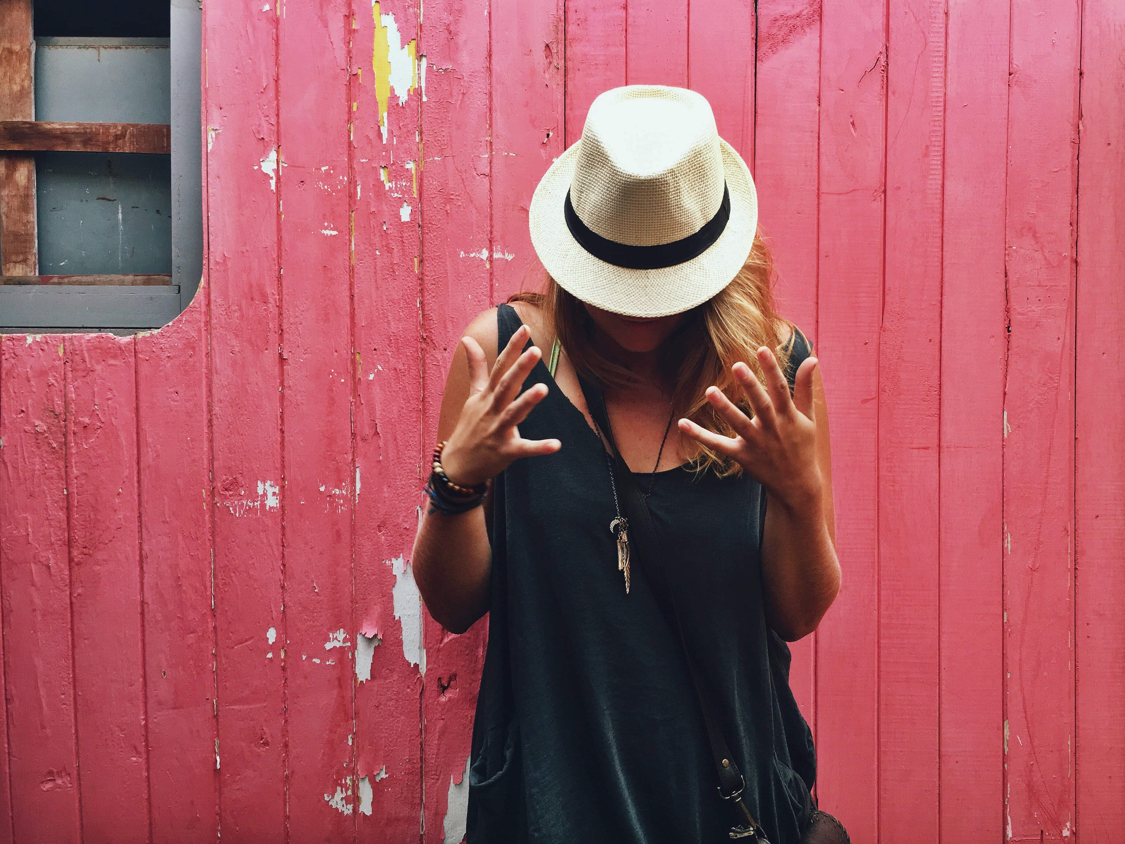 wall, standing, women, lifestyles, clothing, fedora, obscured face, technology, young women, hairstyle, white, hat, wood wall, necklace, woman, beside, HD Wallpaper