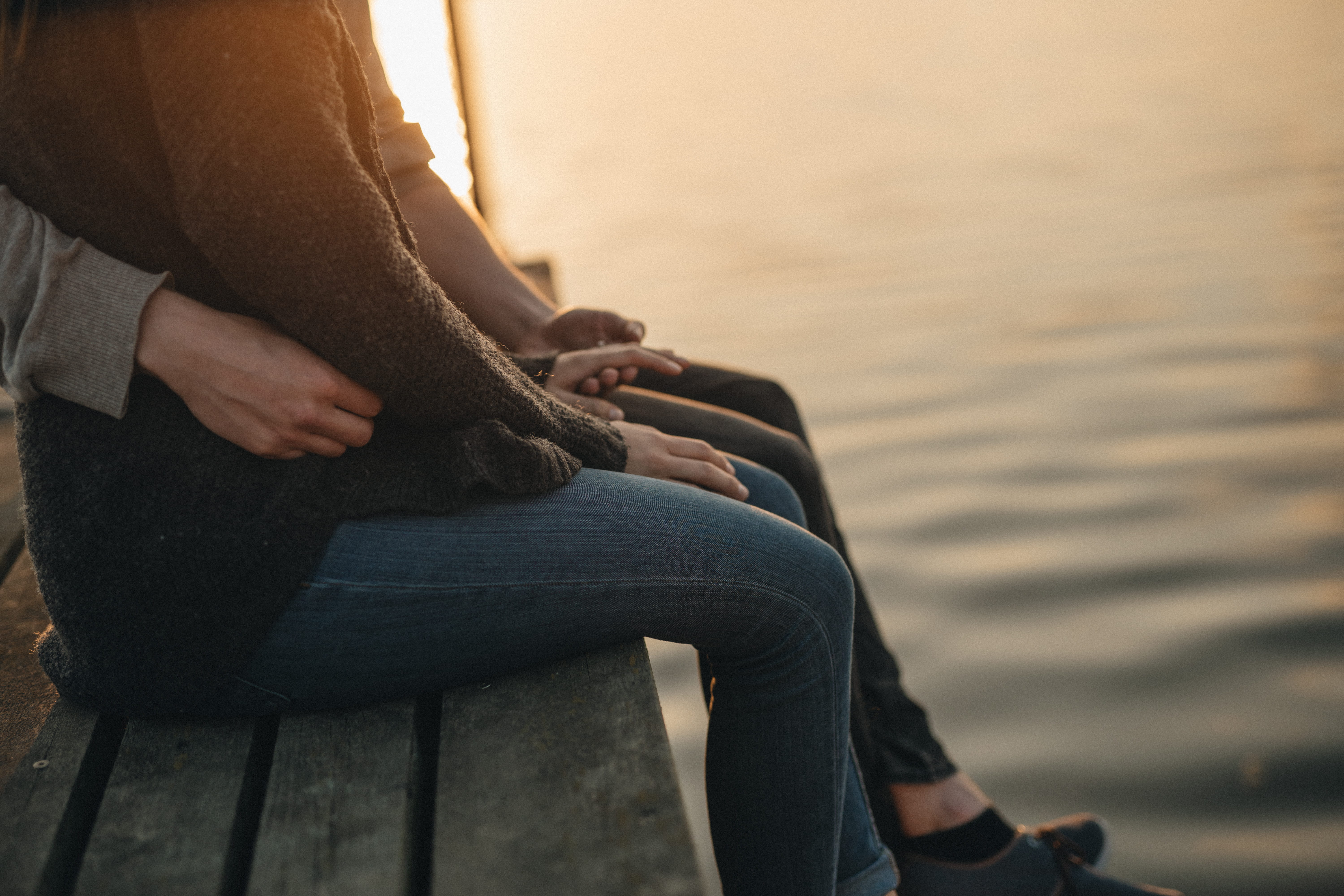 adult, man and woman, human hand, female, leisure activity, 5K, wooden, day, male, water, romantic, body part, embrace, sweater, woman, together, focus on foreground, HD Wallpaper