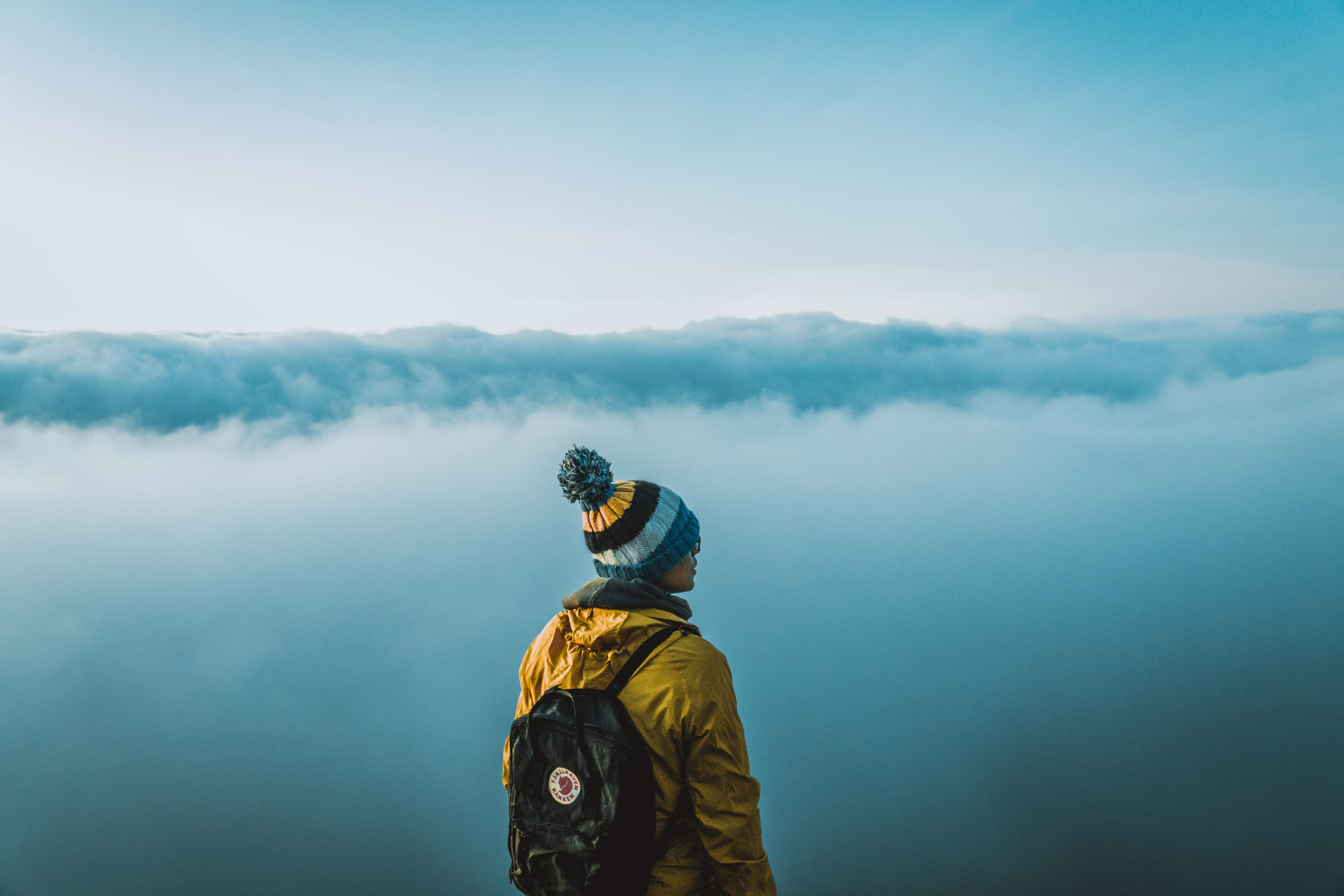 above the clouds, scenics - nature, wearing, clothing, cap, standing, dark, daytime, discover, white, one person, warm clothing, outdoor, looking at view, HD Wallpaper