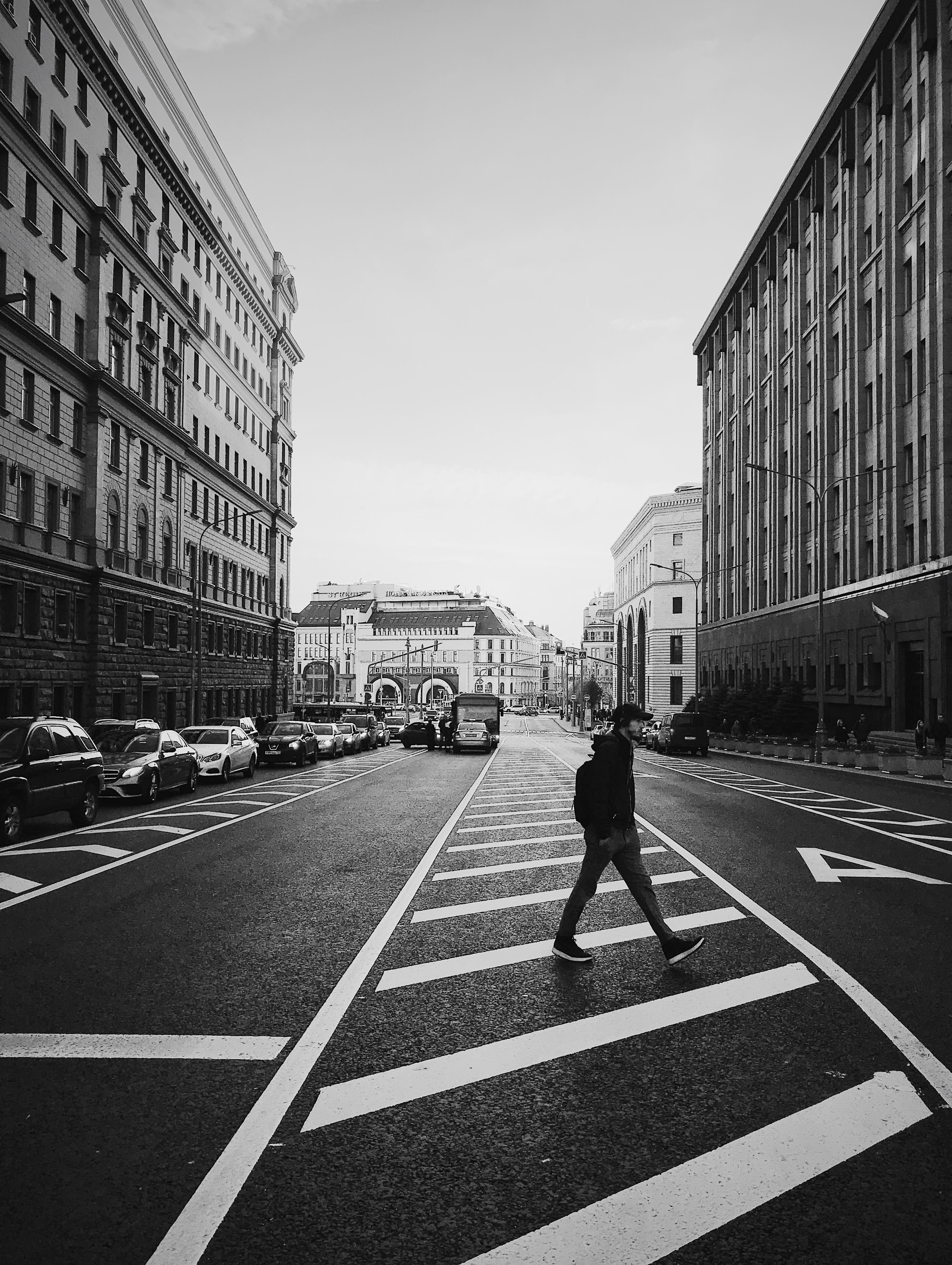 photo, symbol, day, street, urban, city, road, transportation, building exterior, man, full length, city street, building, crossing, rise, male, mode of transportation, Phone HD Wallpaper