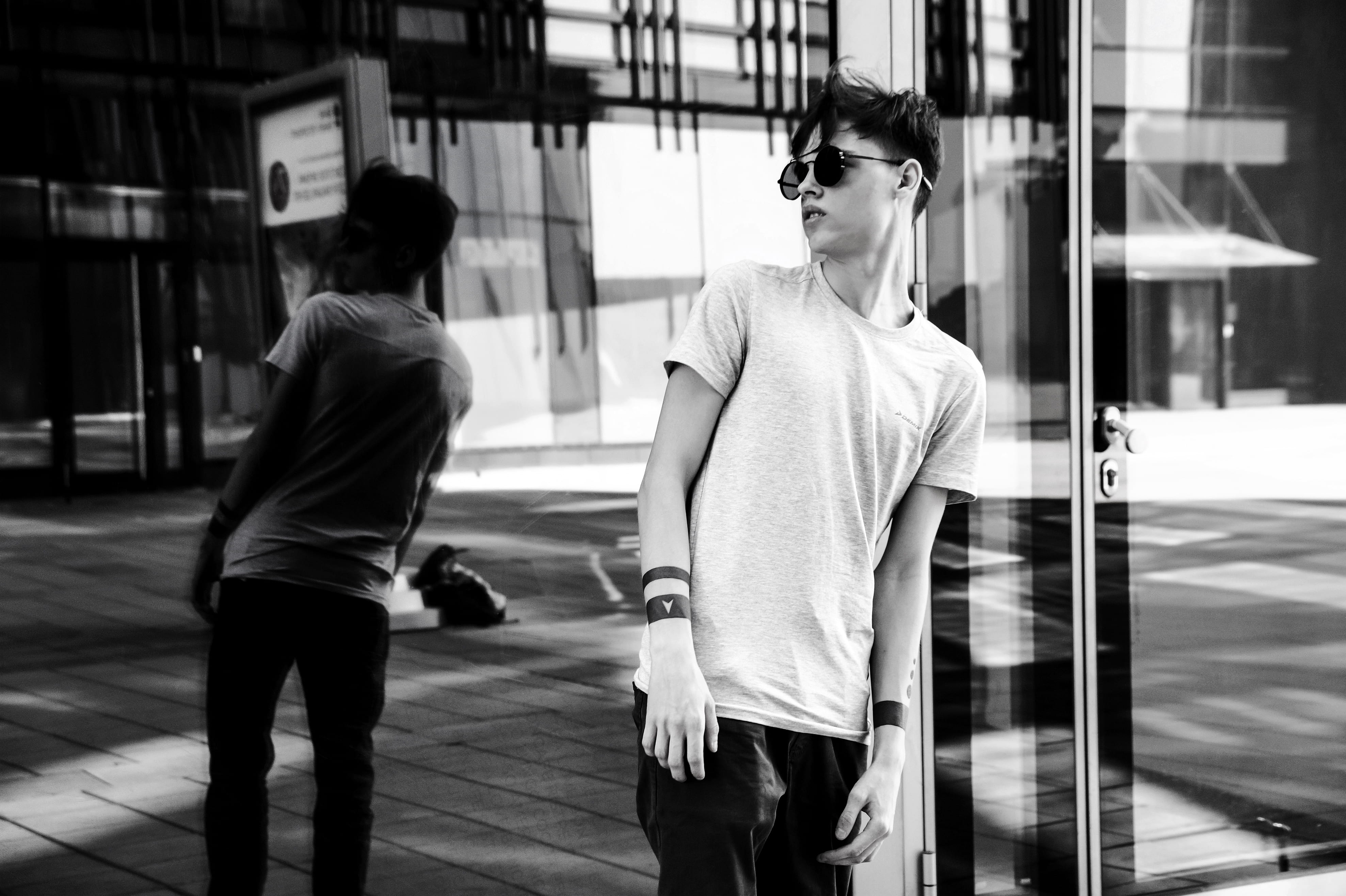looking, men, 4K, black and white, built structure, three quarter length, wall, right, person, side, photography, gray, model, city, transparent, man, HD Wallpaper