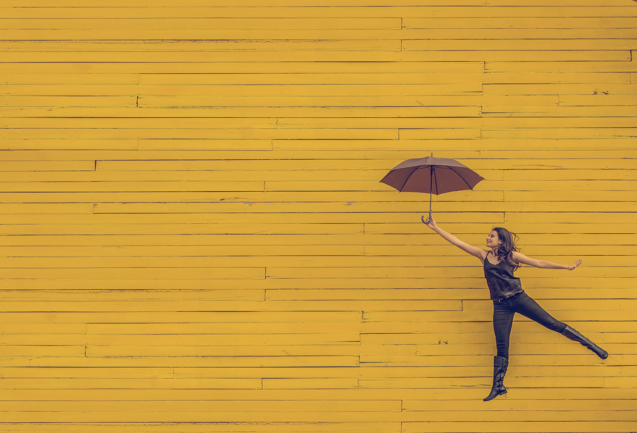 security, woman, wall, outdoors, weather, people, umbrella, lifestyles, photography, rain, day, jump, real people, fashion, protection, holding, one person, HD Wallpaper
