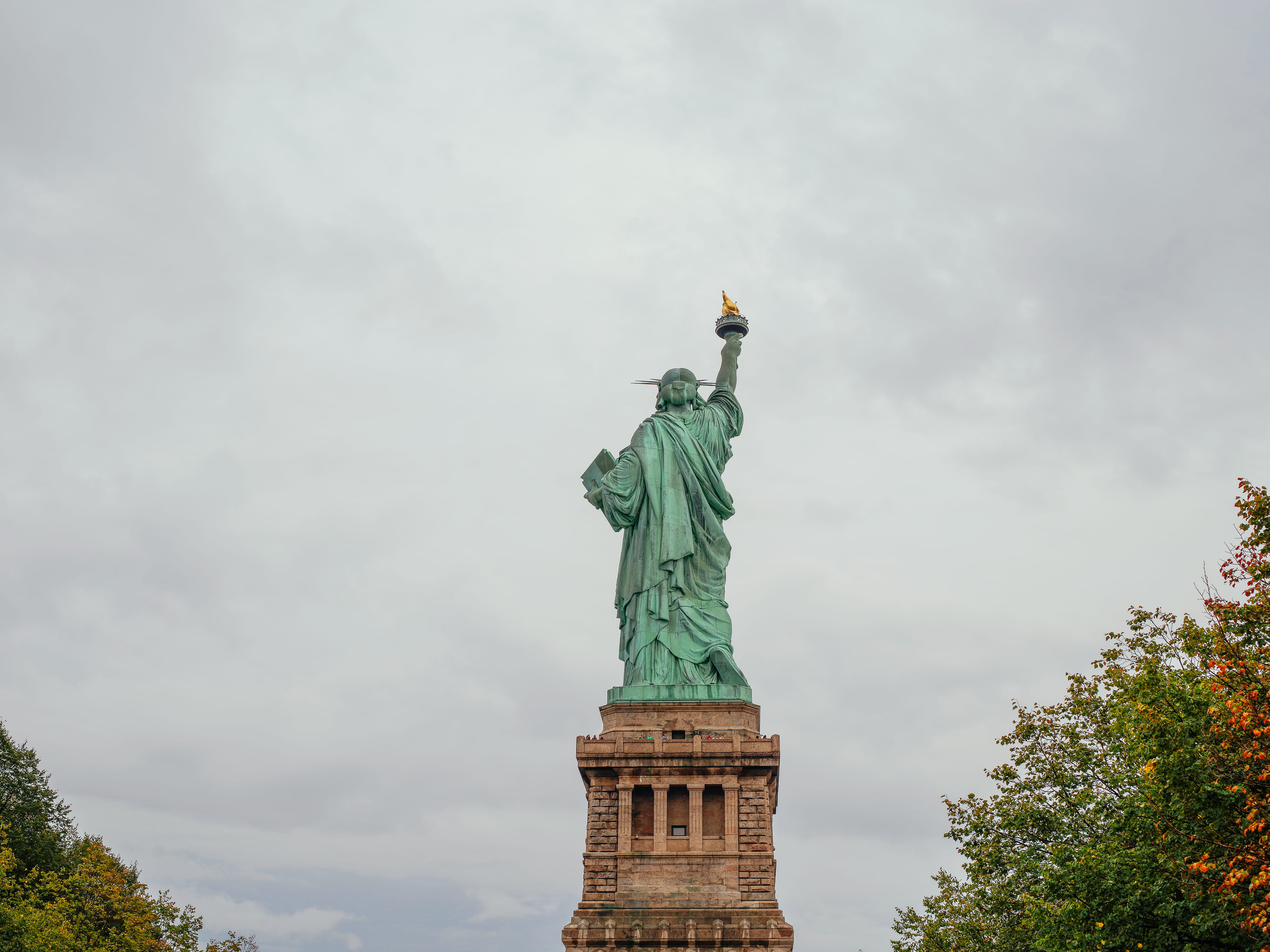 landmark statue, freedom, tree, new, nyc, the past, new york, structure, ellis island, dom, cloud - sky, human representation, monument, no people, travel, HD Wallpaper
