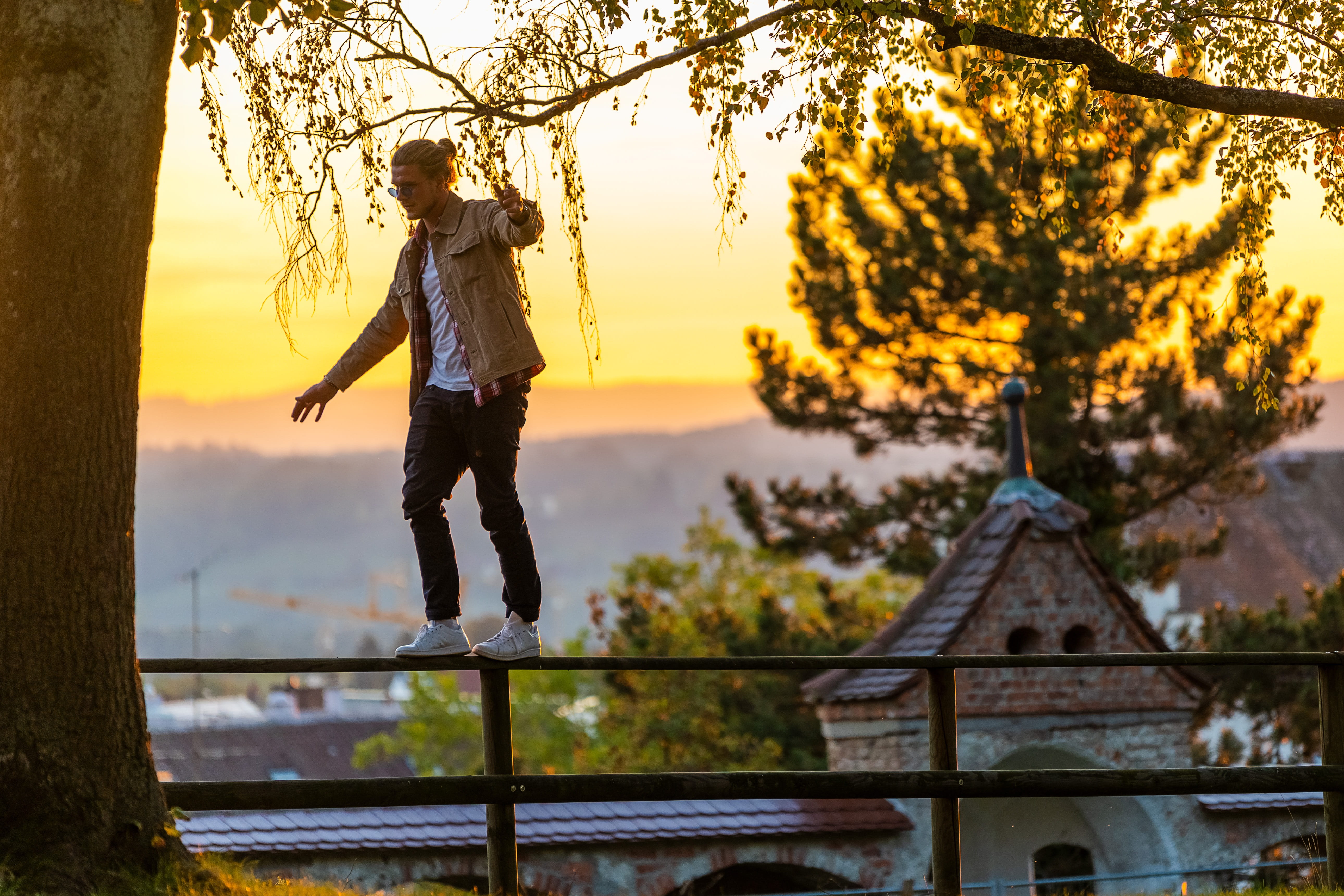 man, standing, full length, yellow, fun, sunlight, teenager, sunset, city, young adult, boy, beauty in nature, adult, young, outdoors, courageous, portrait, HD Wallpaper