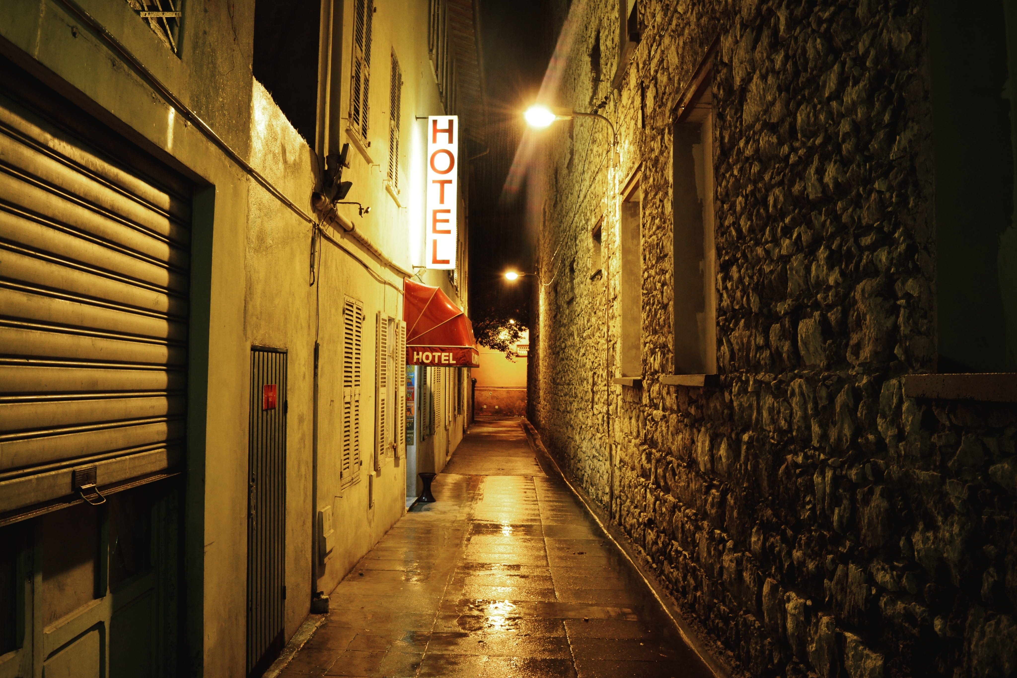 brown, lighted, building exterior, direction, neon sign, village, street light, illuminated, street, alley, 4K, no people, built structure, footpath, in a row, HD Wallpaper