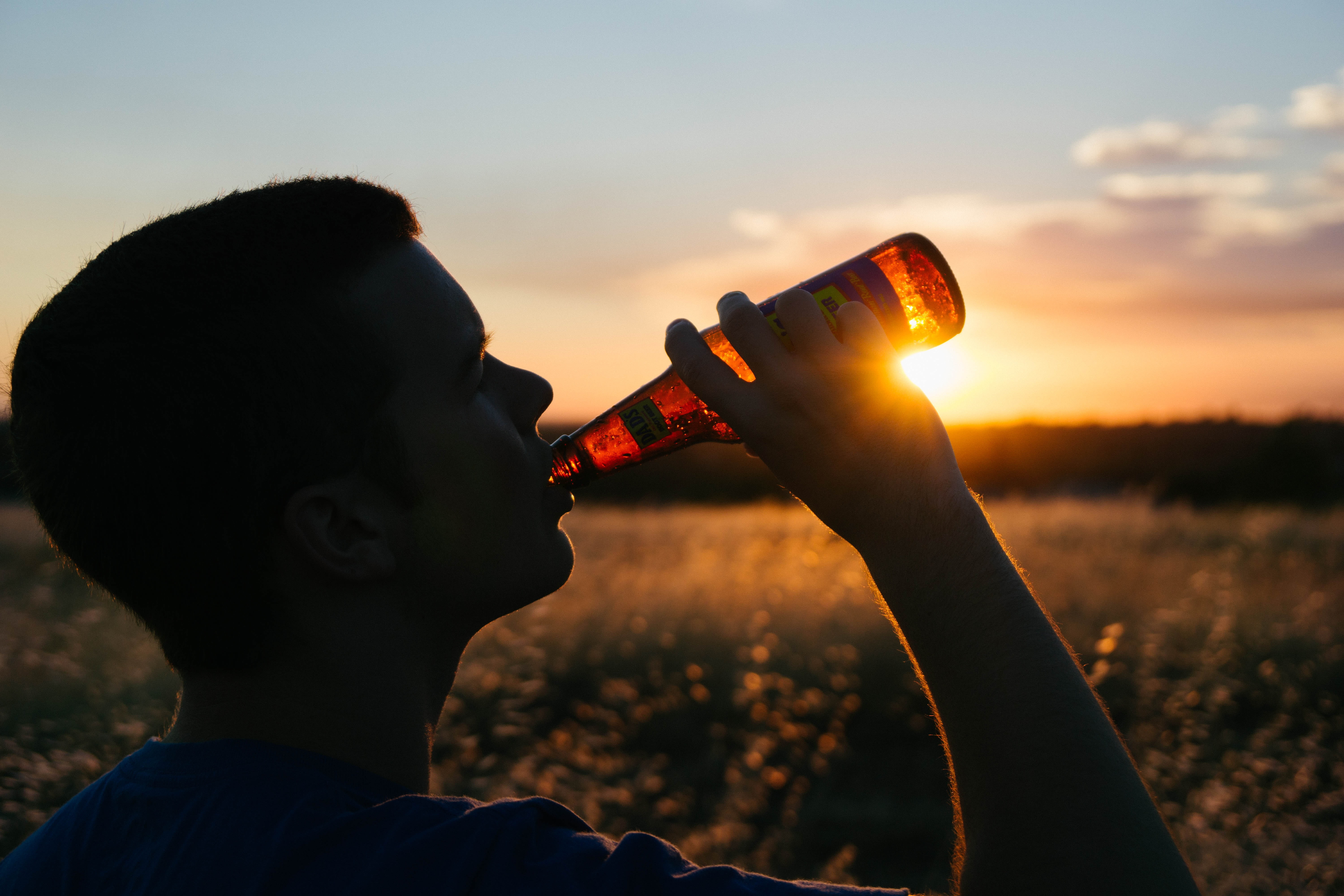 people, communication, outdoors, young Adult, lens flare, profile view, wireless technology, drinking, sun, beer, man, bottle, glass, close-up, alcohol, HD Wallpaper