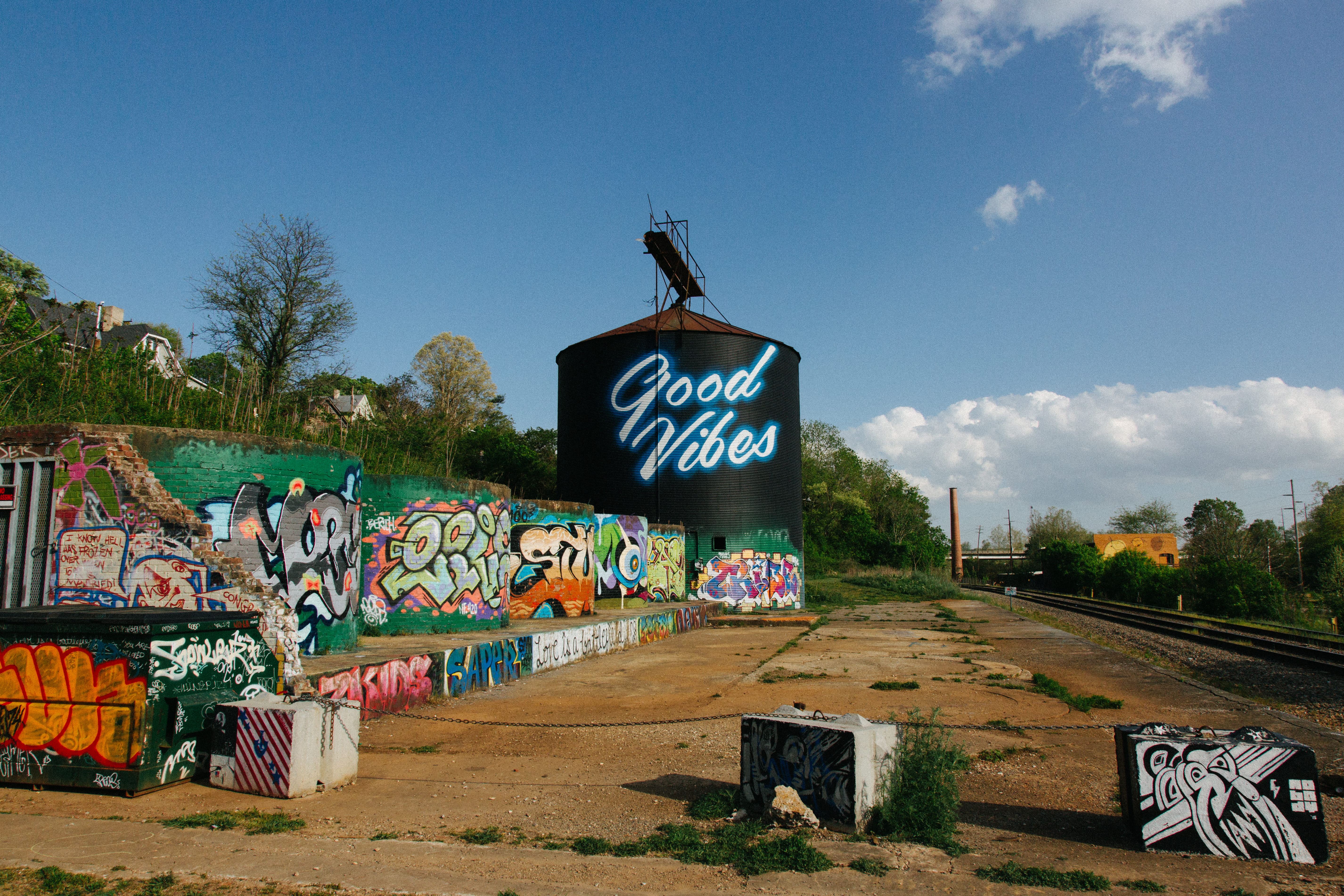 architecture, cloud - sky, western script, good, sign, street art, city, plant, multicolored, printed, urban, silo, human representation, tower, outdoors, HD Wallpaper