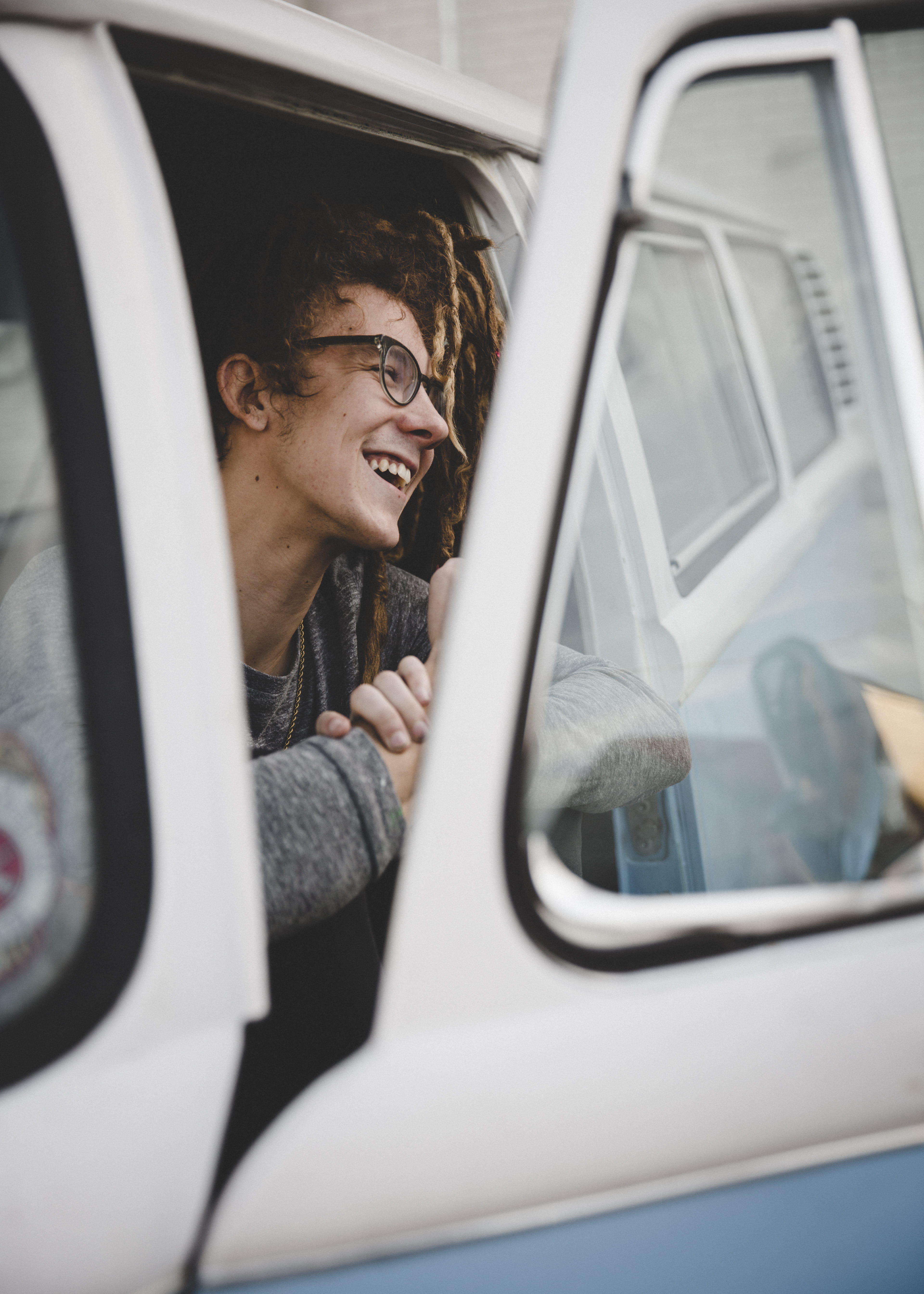 adult, laughing, vibe, chill, good time, inside, window, headshot, car, transportation, motor vehicle, one person, outdoors, hairstyle, travel, smiling, Phone HD Wallpaper