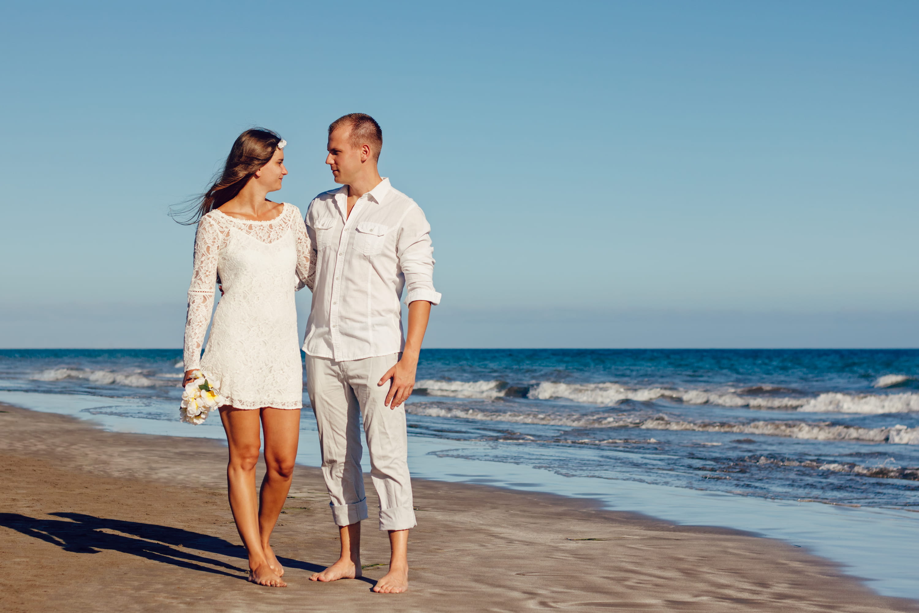ocean, seashore, togetherness, sunlight, standing, couple - relationship, man, positive emotion, couple, adult, people, land, leisure activity, beach wedding, HD Wallpaper