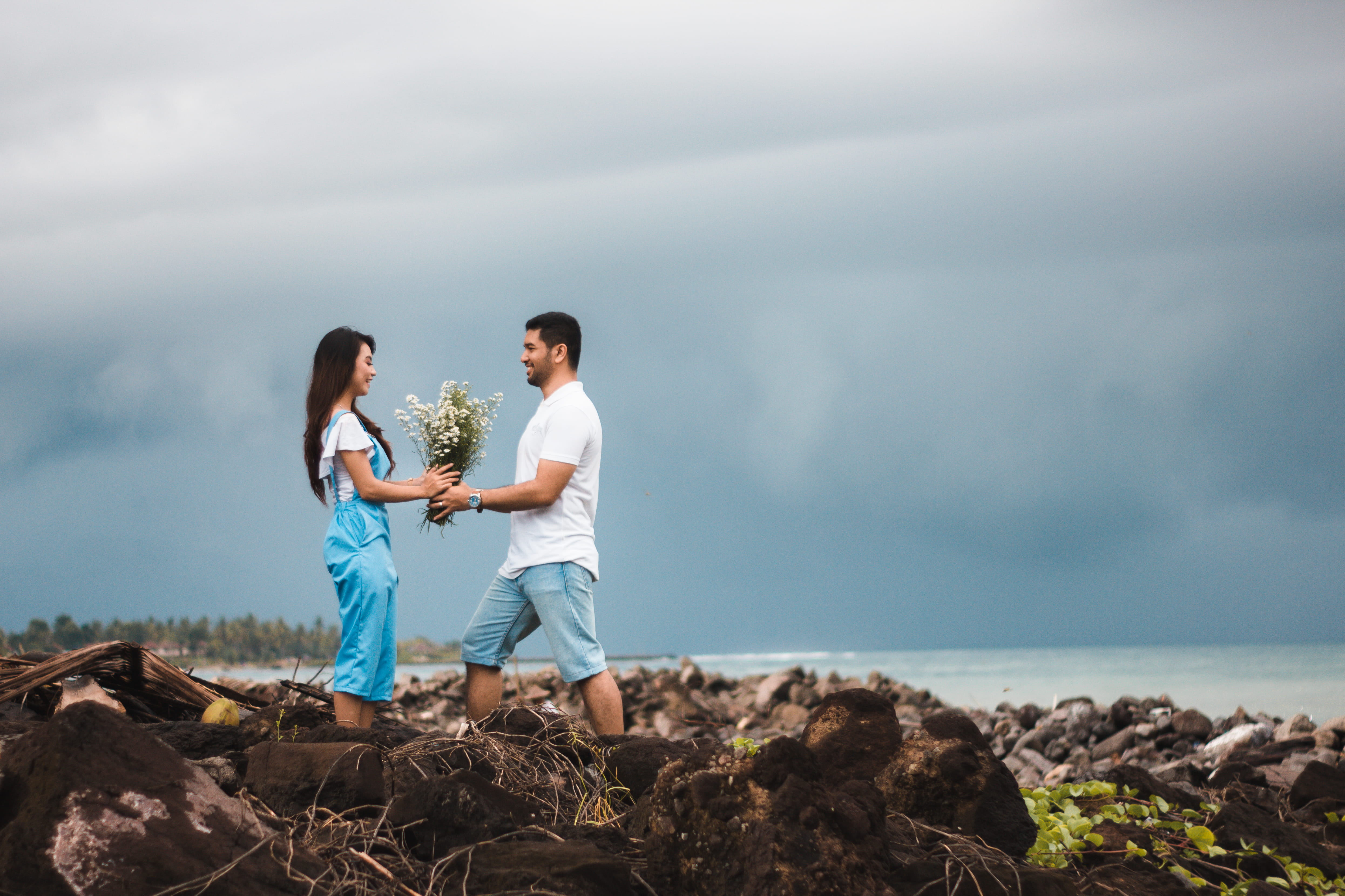 standing, emotion, wear, leisure, cloudy, 4K, romance, recreation, young men, clouds, adult, flowers, young adult, beach, photoshoot, rock, vacation, landscape, HD Wallpaper