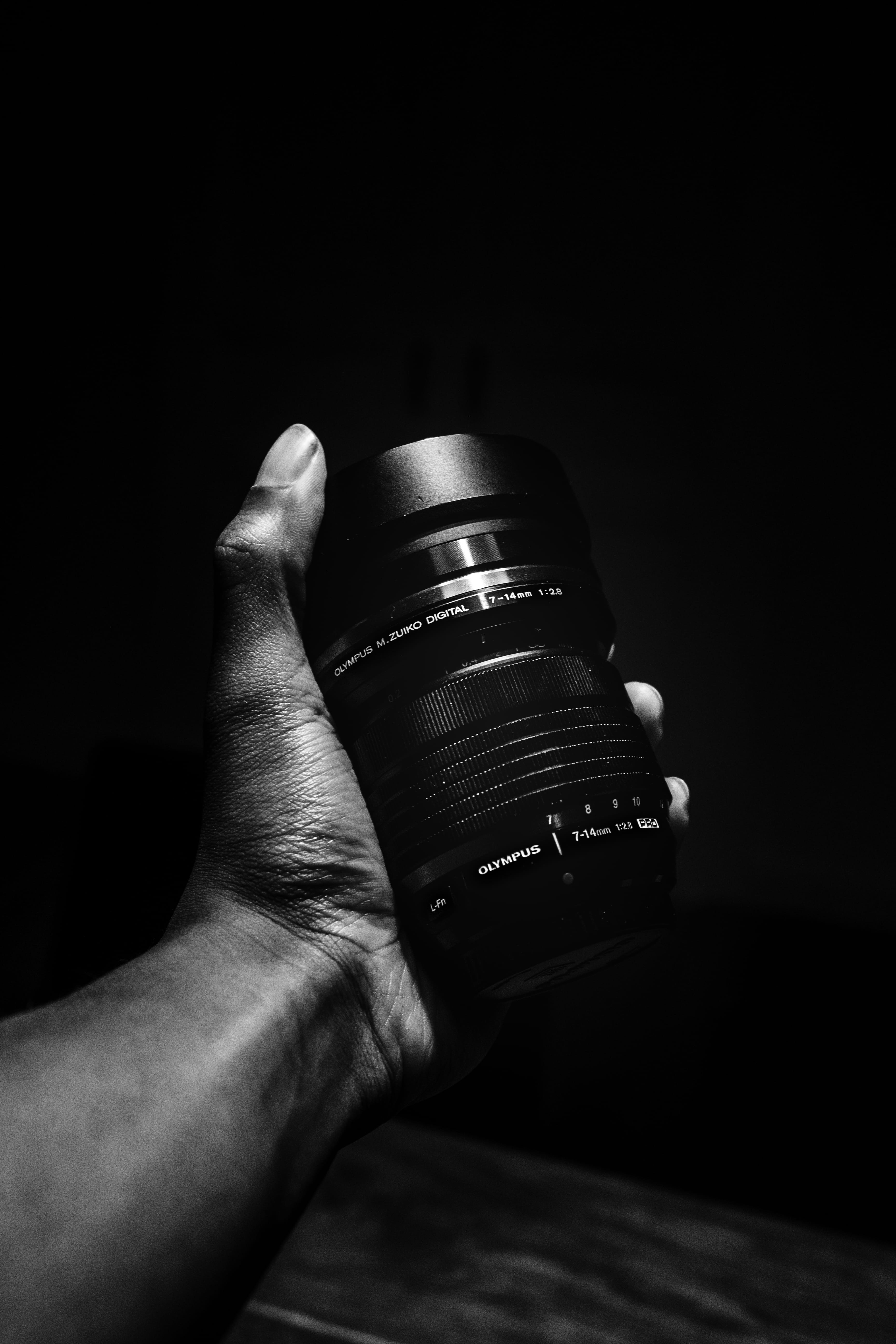 finger, black background, human finger, men, lifestyles, lens, one person, olympus, indoors, camera lens, micro four thirds, black and white, 5K, unrecognizable person, Phone HD Wallpaper