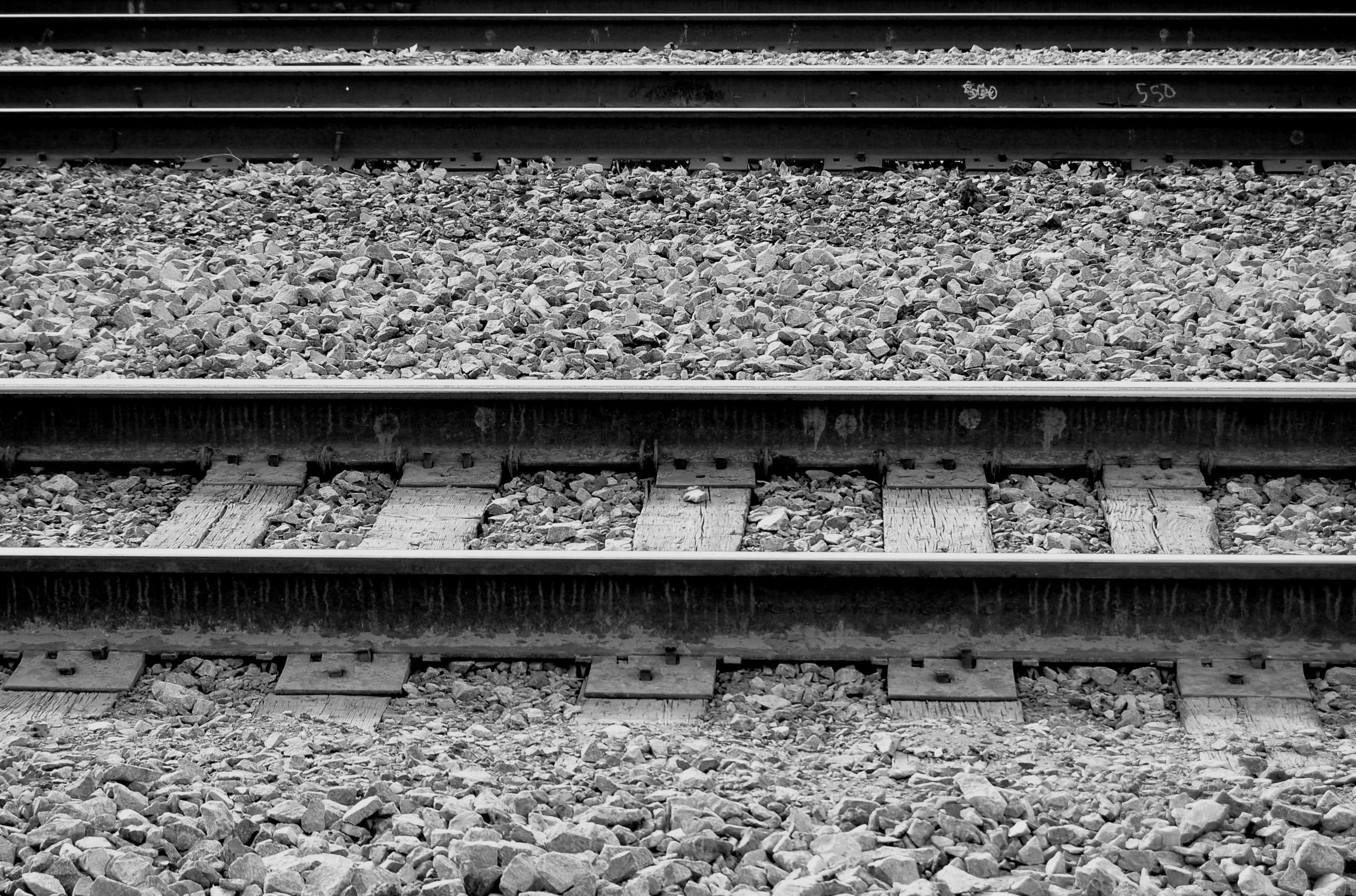 tracks, outdoors, stone - object, metal, 2K, day, rail, stone, side by side, high angle view, rock, rail transportation, railroad track, gravel, black and white, HD Wallpaper