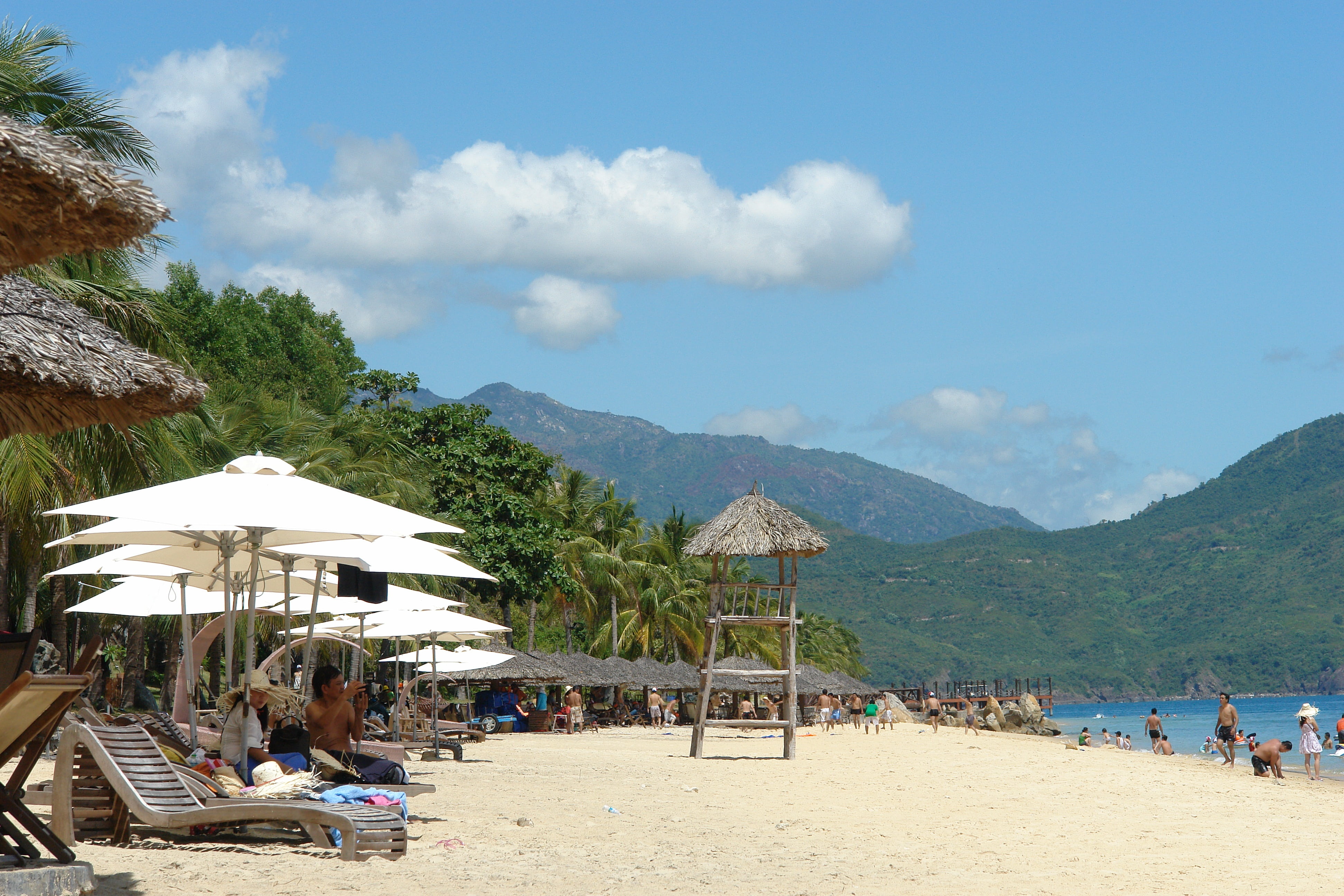 sea, khanh hoa, beach, trip, vacations, leisure activity, sand, beauty in nature, mountain, water, tree, day, crowd, outdoors, group of people, nature, HD Wallpaper